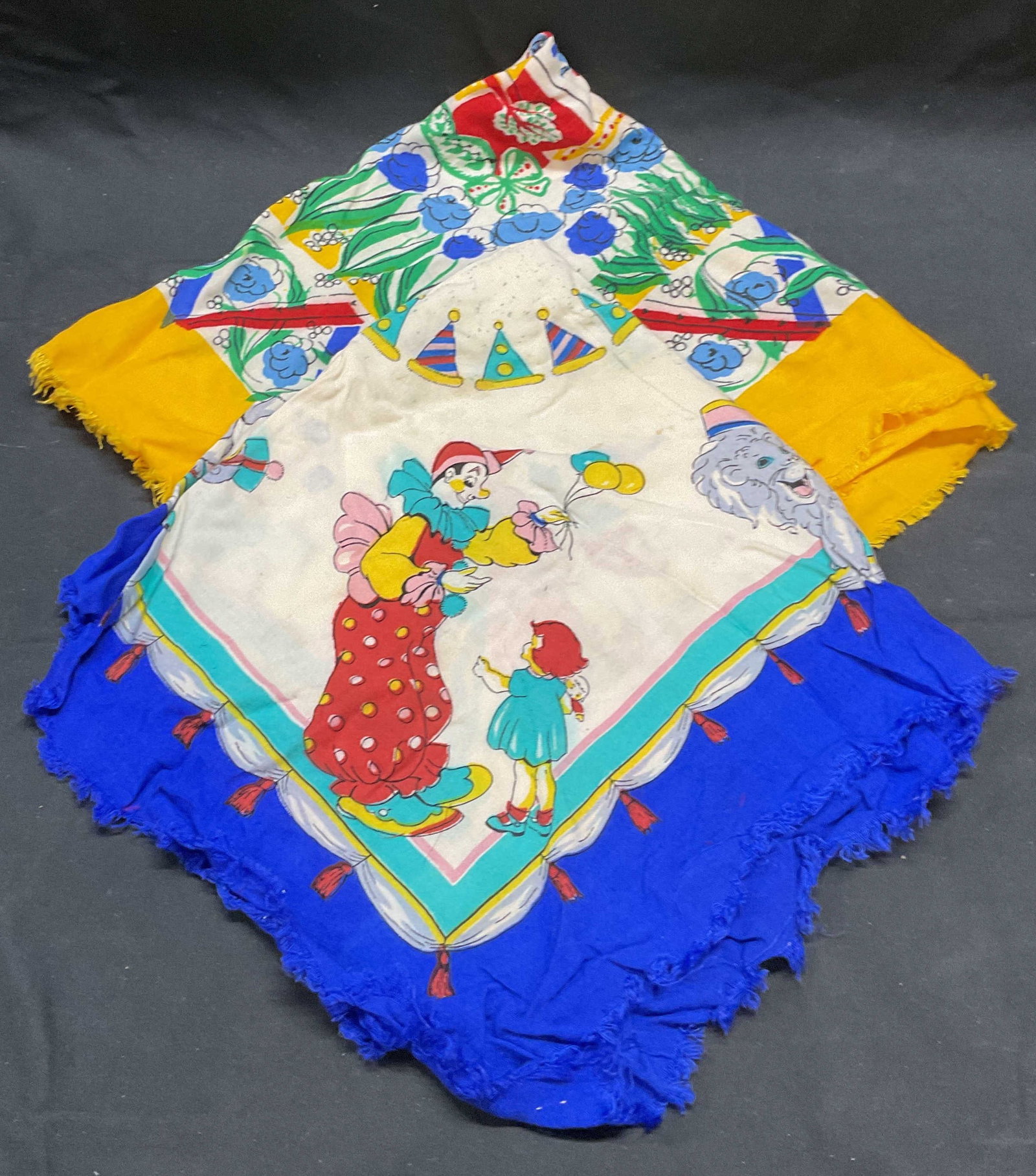 Lot 2 Vintage Clown Circus Print Scarf +: Lot of 2 vintage cotton scarves. Clown and circus print and floral and couple print. Measure approx. 23 x 23 inches each, both pieces have wear including blemishes and pulling observed. Scarf, vintage