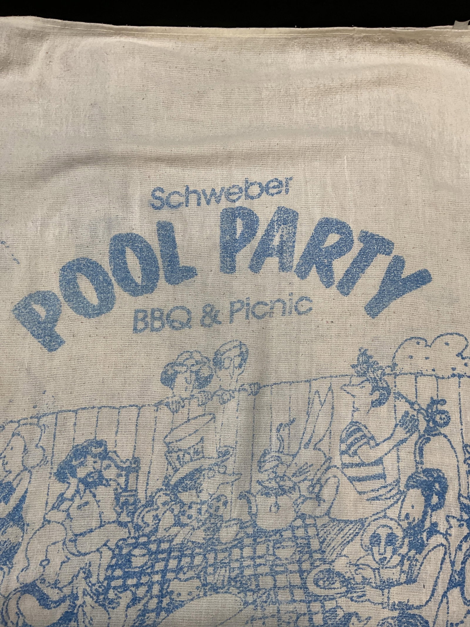 Vtg Schweber Pool Party BBQ Picnic Cotton Throw: vintage Schweber graphic print white and blue throw. Reads Schweber Pool Party BBQ and Picnic, August 1986. Material feels like cotton. Measures approx. 60 x 31 inches. Wear to material including pill