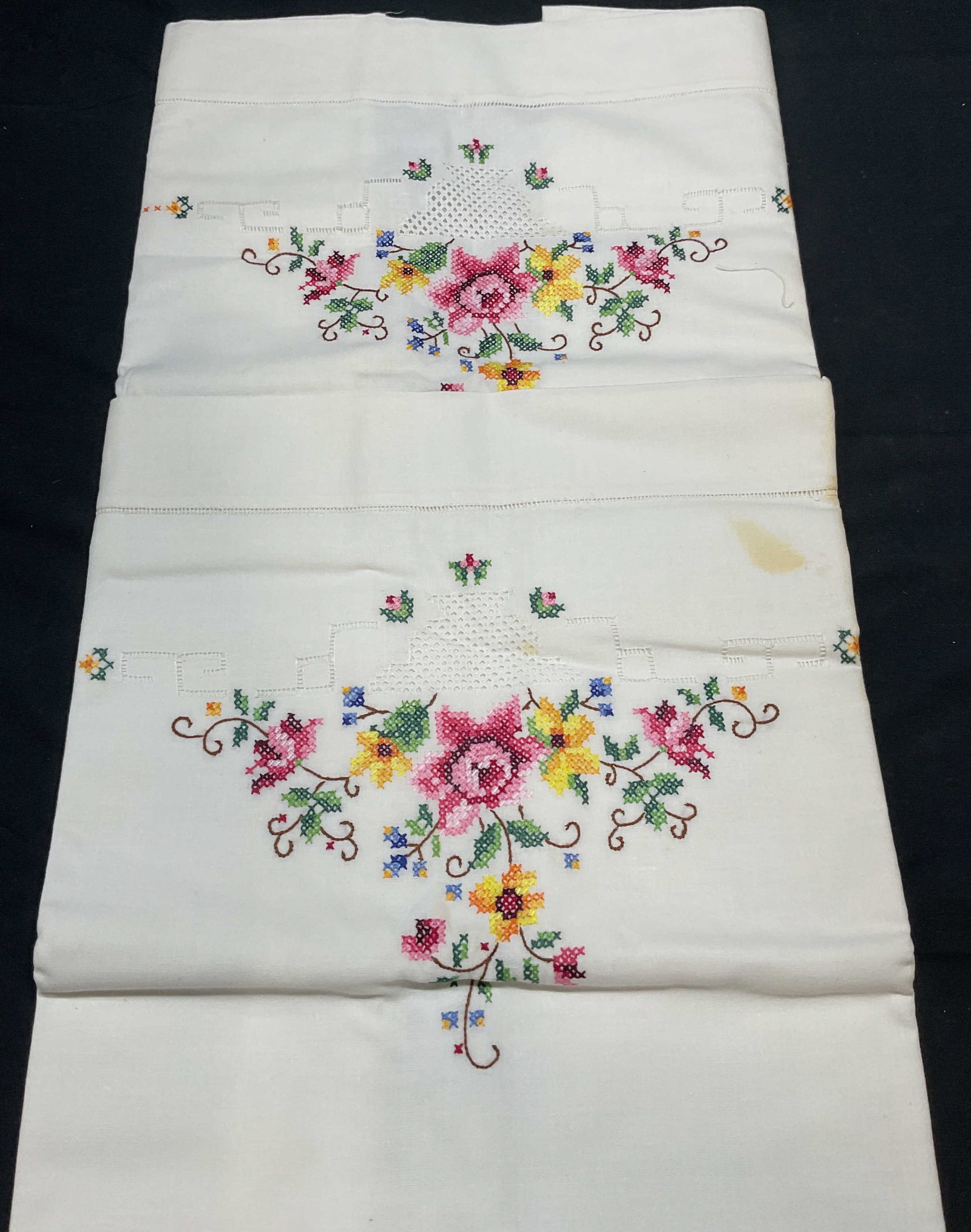 Group Lot Floral Embroidered Pillowcases: Group lot of white floral embroidered pillowcases. Measure approx. 29.5 x 20 inches. Feel like cotton. Some blemishes observed, additional wear may be present. Pillowcase, white pillowcase, floral pil