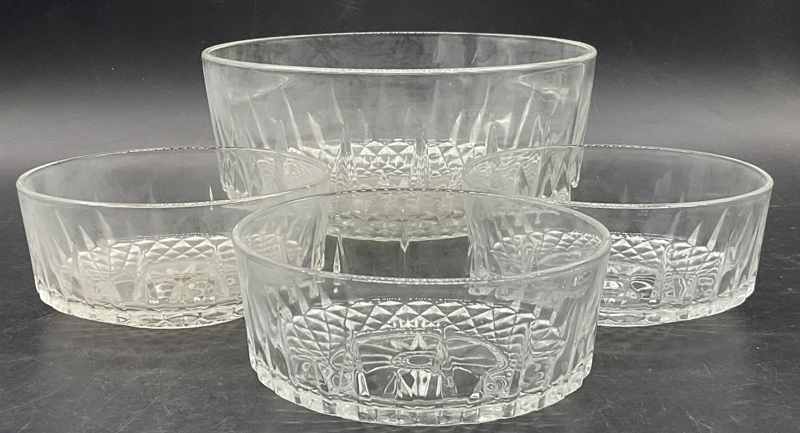 4 ARCOROC FRANCE Cut Glass Bowls, Dinnerware: Four ARCOROC FRANCE Cut Glass Bowls. Three smaller bowls and one larger bowl. Pieces are signed ARCOROC FRANCE. Large bowl measures approx. 3.75H x 8W in. Surface wear and residue present. home decor,