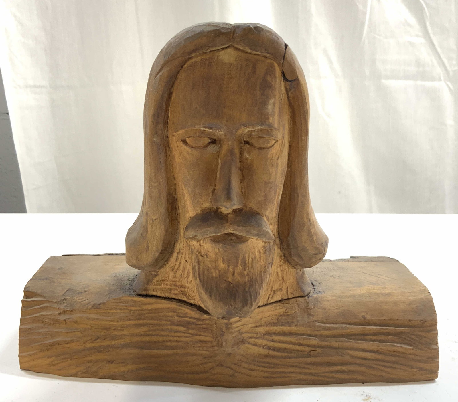 Vintage Jesus Christ Bust Wood Carving: Wood carving is signed illegibly on underside. Piece is tan toned and wooden. Wood carving appears to depict Jesus Christ. Carving appears to be vintage. 8.5 inches wide 7 inches tall 5 inches deep. W