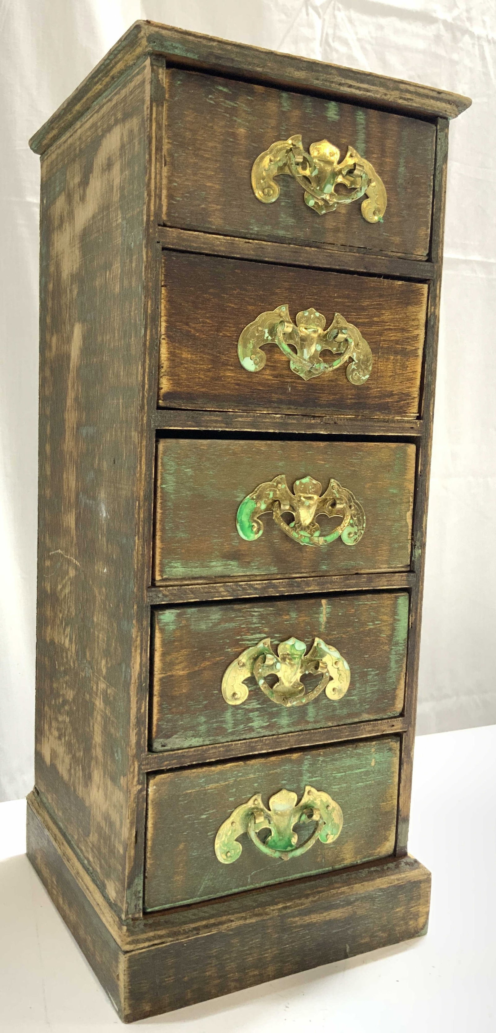 Vntg 5 Drawer Wooden Jewelry Chest: Jewelry chest is vintage and wooden. Piece is brown toned. Chest has 5 drawers each with gilt metal pulls. Jewelry chest measures approx 14.5 inches tall 6 inches wide & deep. Chest, wooden chest, jew