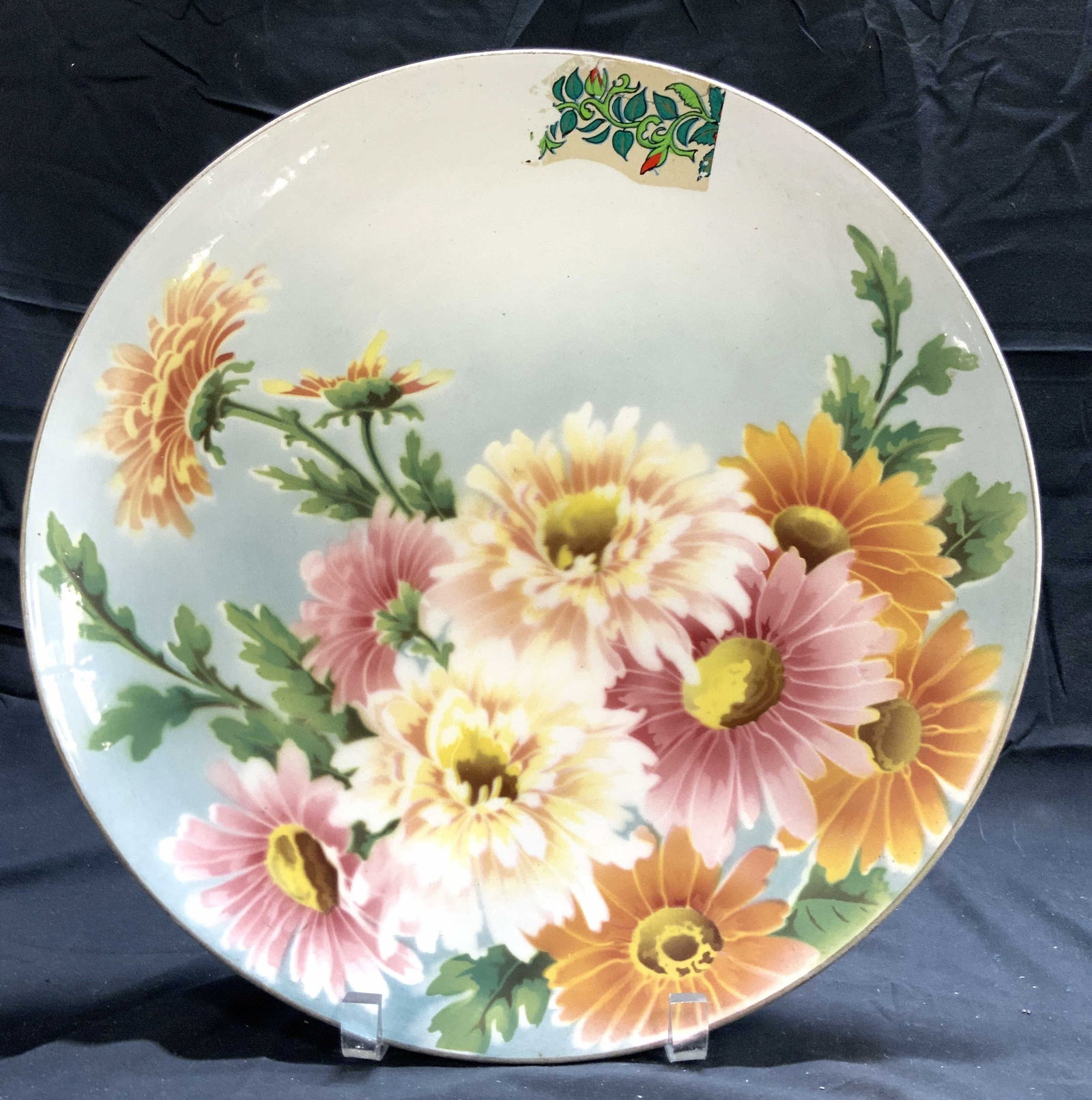 K&G LUNEVILLE FRANCE Vtg Floral Porcelain Plate: Underside is marked K&G LUNEVILLE FRANCE. Plate is porcelain. Piece is vintage. Plate has multi toned floral and leaf detail. Piece has circular form. Plate measures approximately 15 inches diameter. 