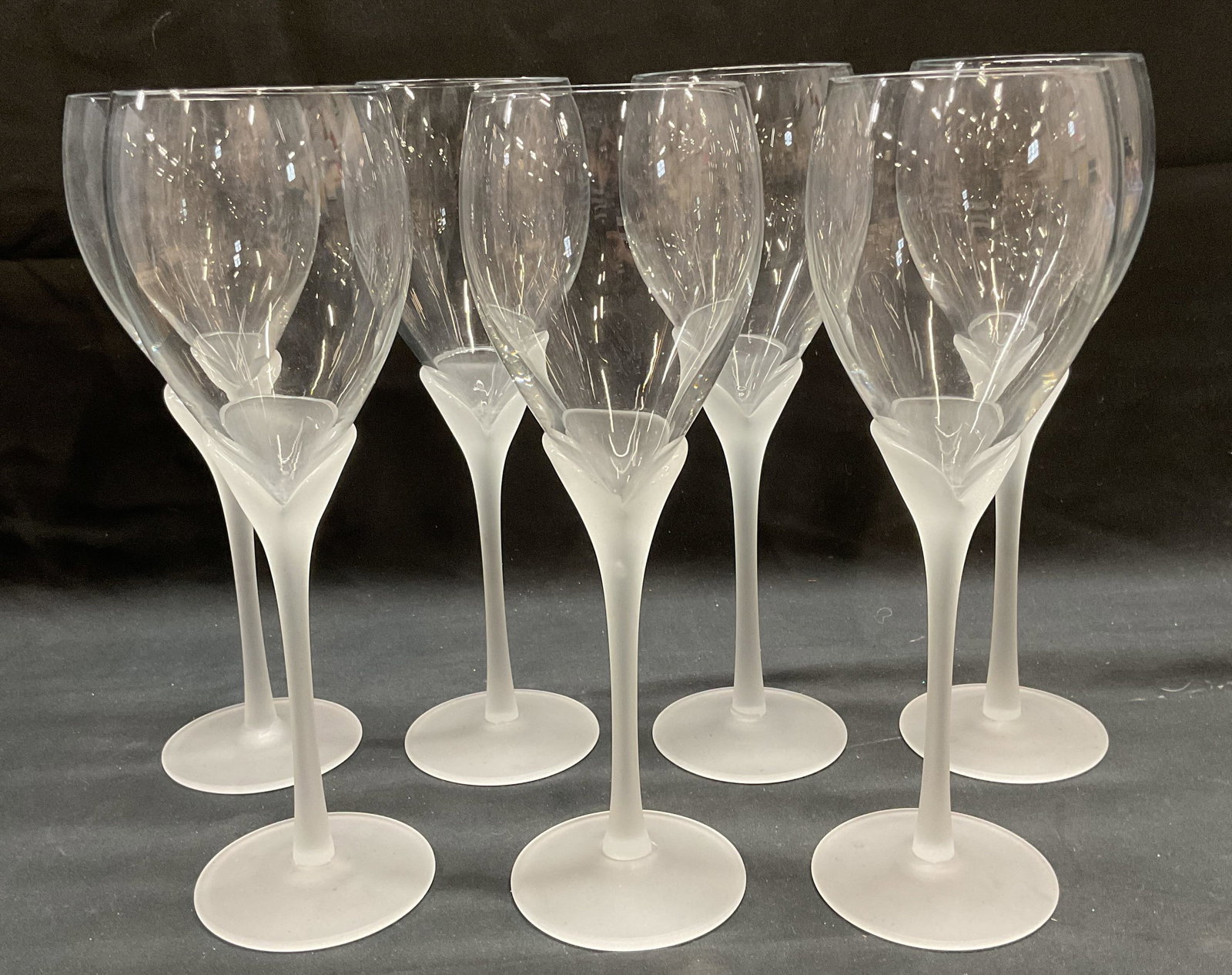 Set 7 Frosted Stem Tulip Wine Glasses: Set of 7 tulip wine glasses with frosted stems. Measure approx. 3 x 9.25 inches. Some scratching observed to all. Wine glasses, wine glass set, tulip wine glasses, flower wine glasses, frosted wine gl