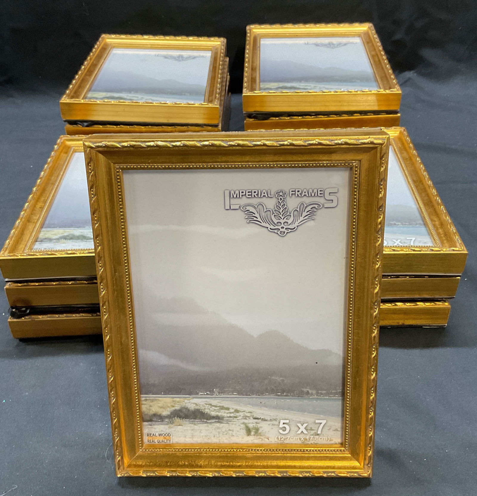 Set 15 Imperial Frames Gilt Wood Frames NWOT: Set of 15 IMPERIAL frames gilt wooden picture frames. Raised decorative borders. Frames measure 5 x 7 inches each. All pieces appear new without tag. Some wear to frames and loss to gilt consistent wi