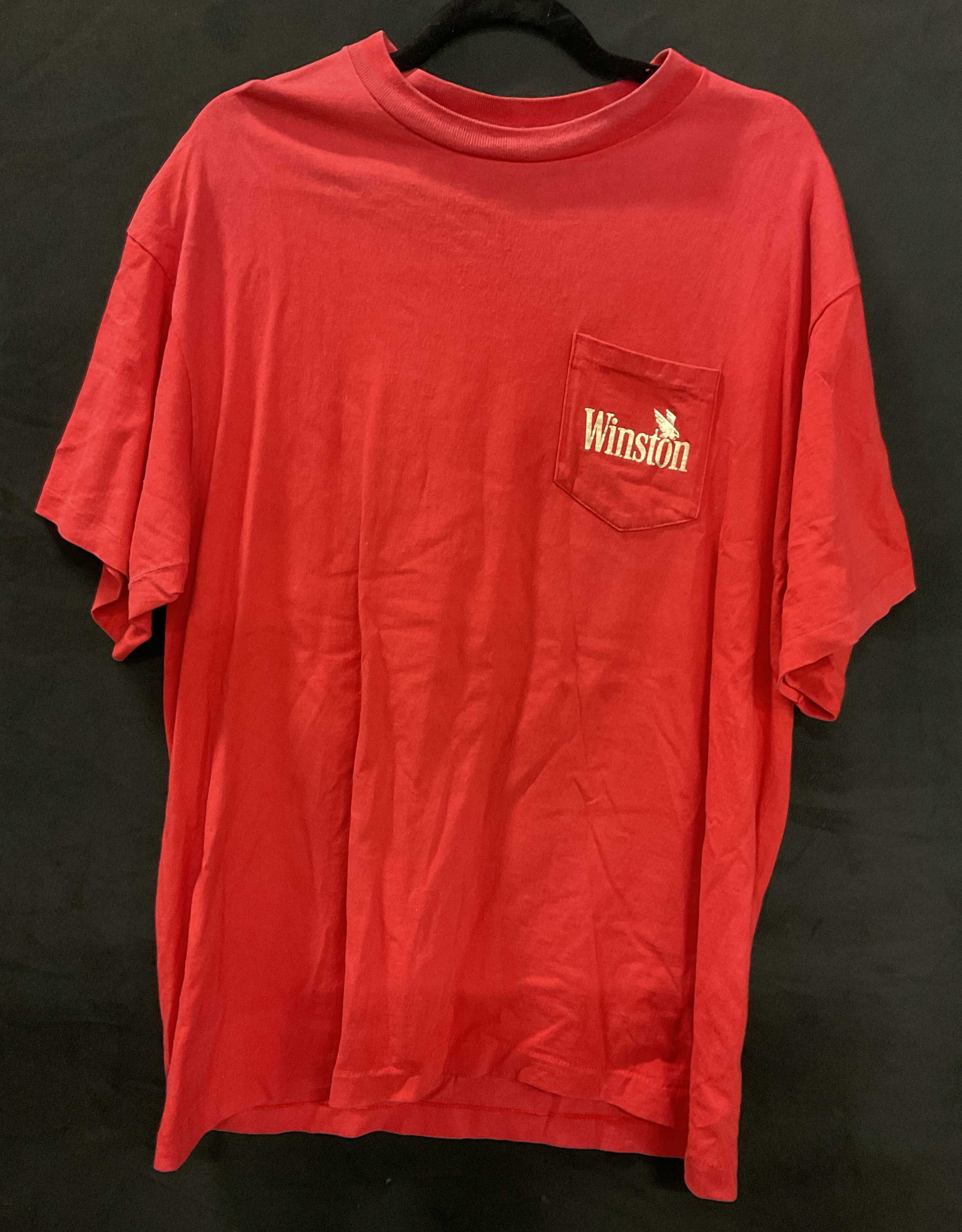 AMERICAN BORN WINSTON Vintage Eagle Shirt, USA: AMERICAN BORN WINSTON Vintage Red Shirt. Obverse features Winston logo on the pocket. Raised Eagle motif to the reverse. Tag reads AMERICAN BORN FOR WINSTON MADE IN USA, XL, 100% COTTON. Measures appr