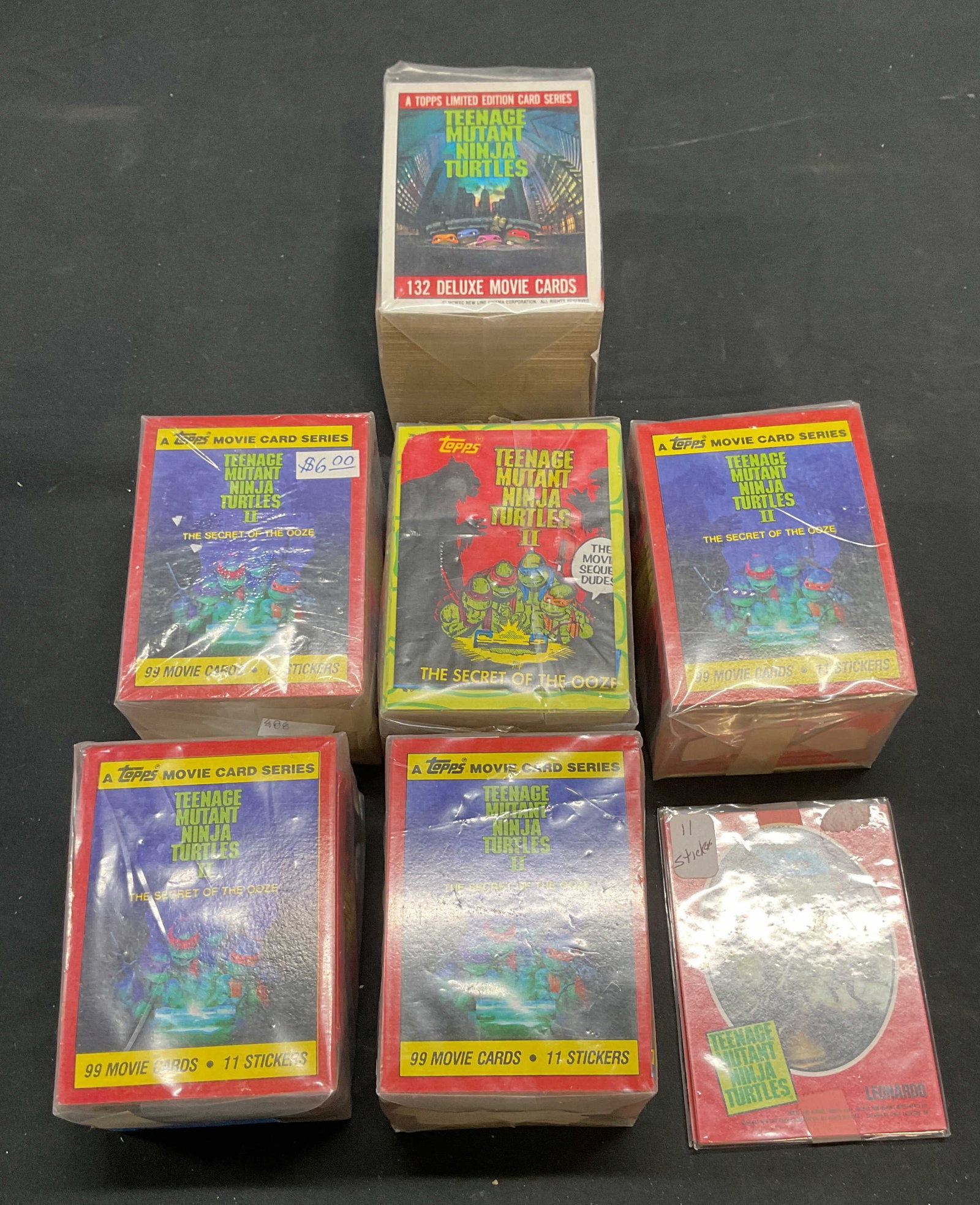 Group Teenage Mutant Ninja Turtle Trading Cards: Group lot of 50+ vintage Topps Teenage Mutant Ninja Turtle trading cards and stickers. Cards measure approx 3.5 x 2.5 inches. All pieces As Is, not examined individually or for completion. Cards may h