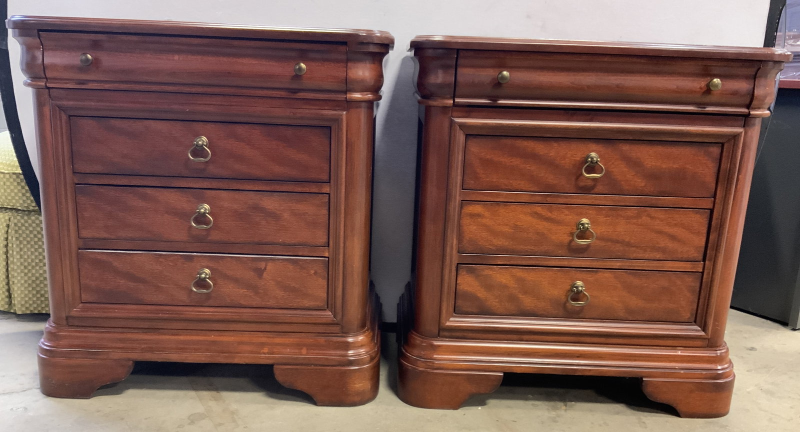 Pair 4 Drawers Wooden Nightstands: Lot includes 2 nightstands. Each is piece appears to be wooden possibly veneer & has 4 drawers each. Each drawer has gilt metal handles. Each nightstand measures approximately 31 inches tall 30 inches