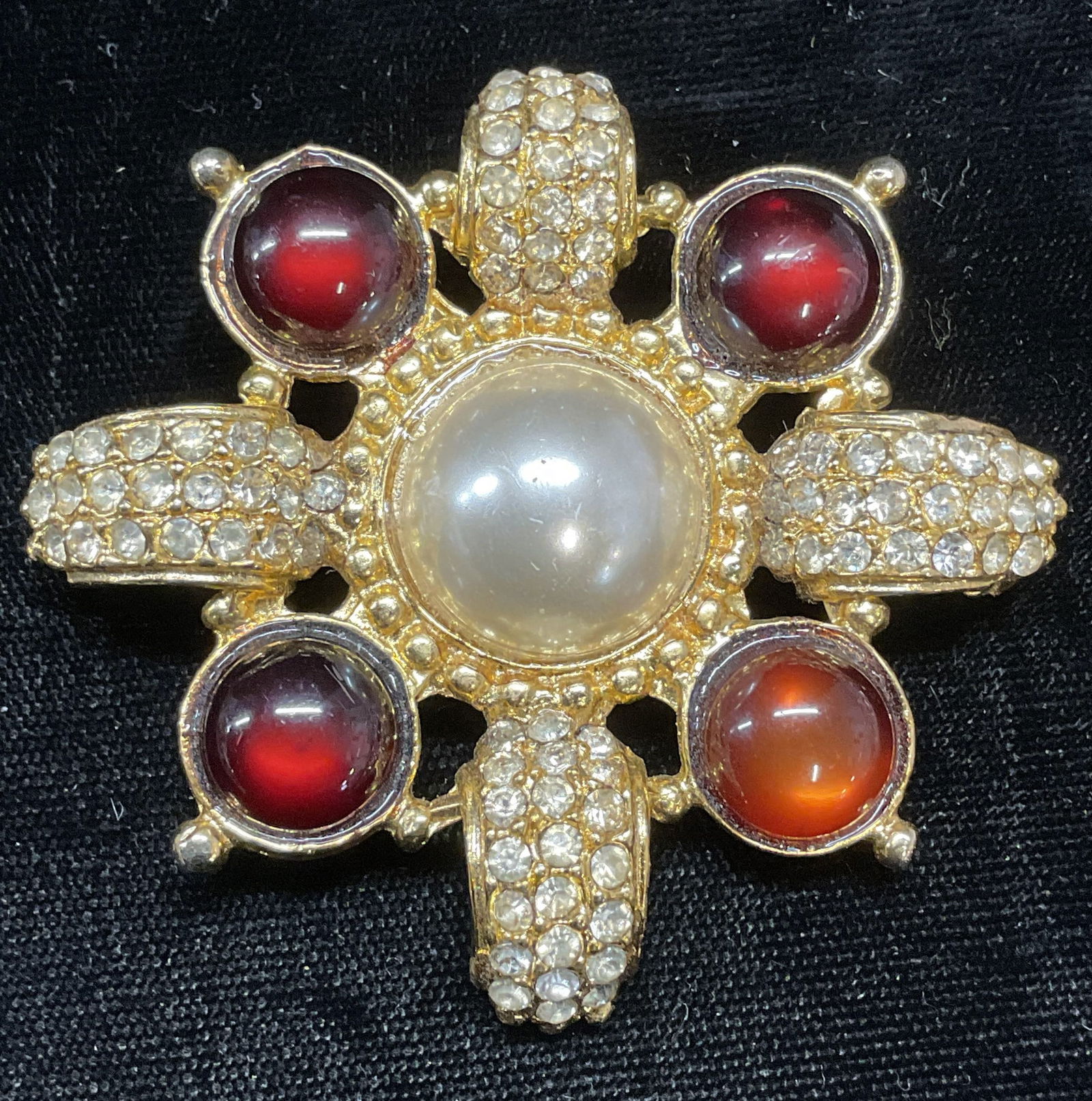 Gold Tone Crystal Faux Pearl Amber Lucite Brooch: Gold tone brooch with colorless crystal faux pearl and amber tone lucite cabochons. Hinge pin on underside. Measures approx 2.5 inches wide. Some wear including scratching observed. Jewelry, estate je