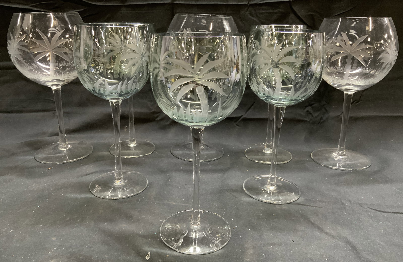 Lot 8 Crystal Wine Glasses LENOX & More: Lot includes 5 wine glasses marked LENOX on underside & 3 additional larger wine glasses. Each piece has frosted palm tree detail. Lenox glasses have slight light blue tint. Largest glasses measure ap