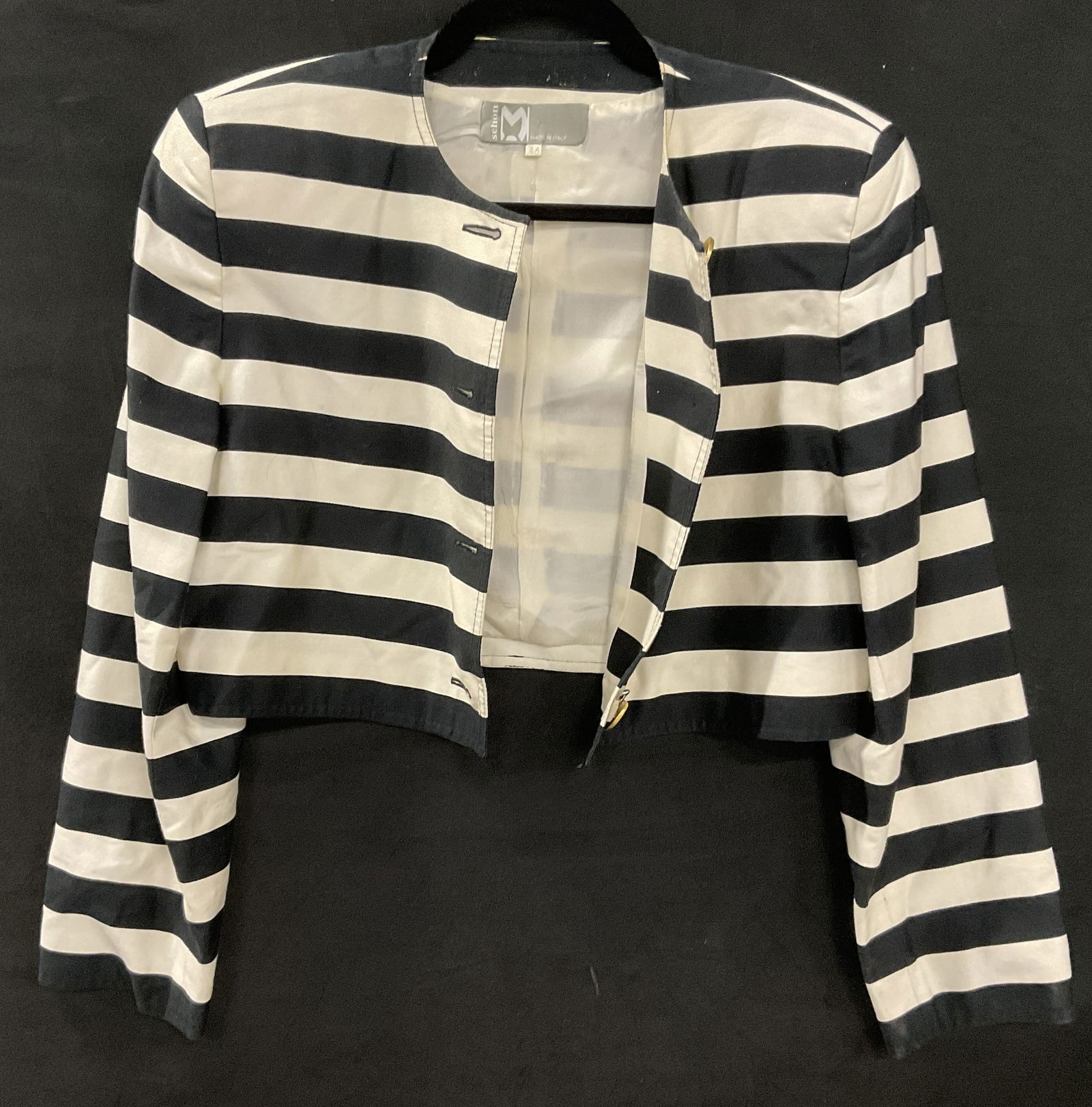 SCHON Vintage Striped Cropped Cardigan, Italy: SCHON Vintage Striped Cropped Cardigan. Gold tone currency motif buttons. Tag reads SCHON, MADE IN ITALY, 46. Material tag reads 100% Cotton. Length measured flat 17 inches. Shoulder pads to piece. Su