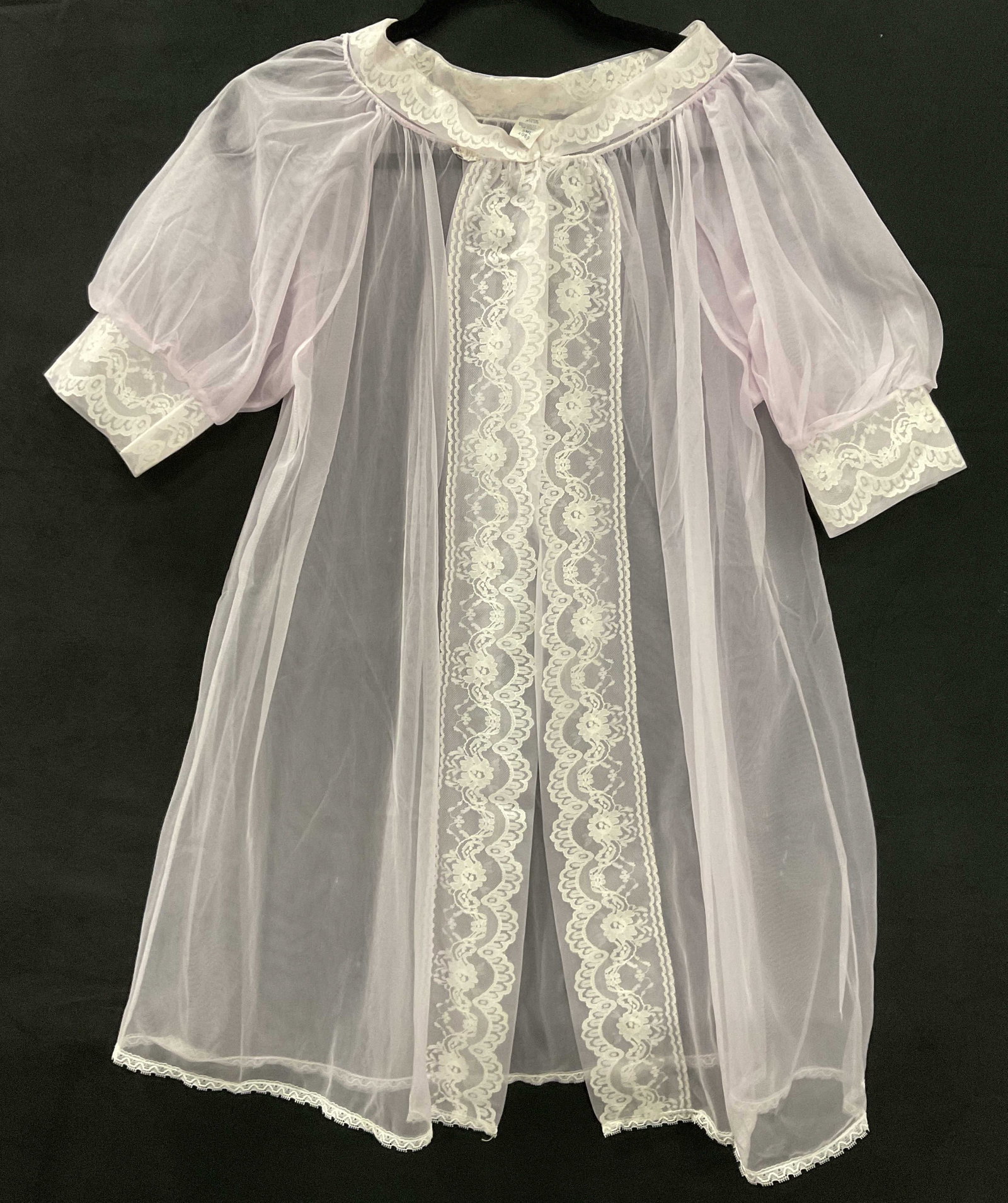 Vintage Pink Sheer Nightgown Robe / Loungewear: Vintage Pink Sheer Nightgown Robe / Loungewear. Lace accents to the piece. One snap closure to the top. Tag reads 100% NYLON, SML. Length measured flat approx. 30 inches. Surface wear, pulls, and loos