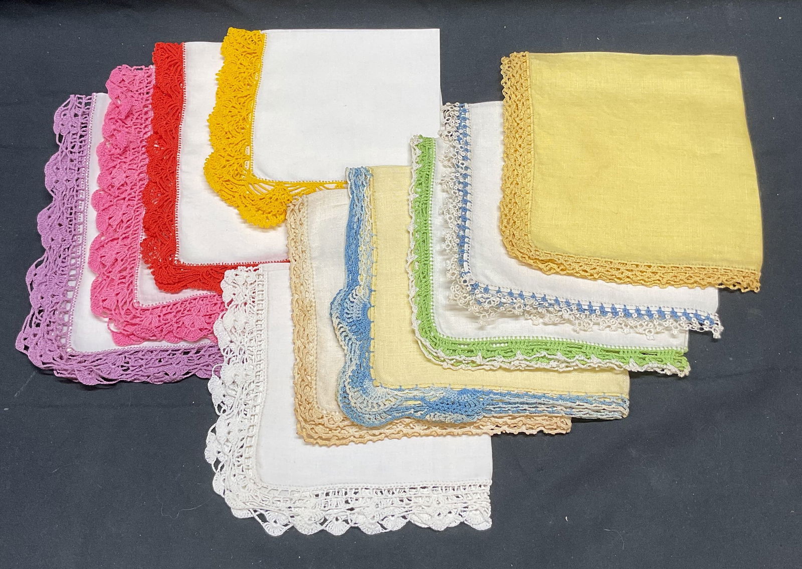 Group Vintage Assorted Colored Handkerchiefs: Group lot of vintage assorted handkerchief. White with colored lace borders and yellow with lace borders. Feel like cotton. Largest approx 13 x 13 inches. All pieces have wear including blemishes. Han