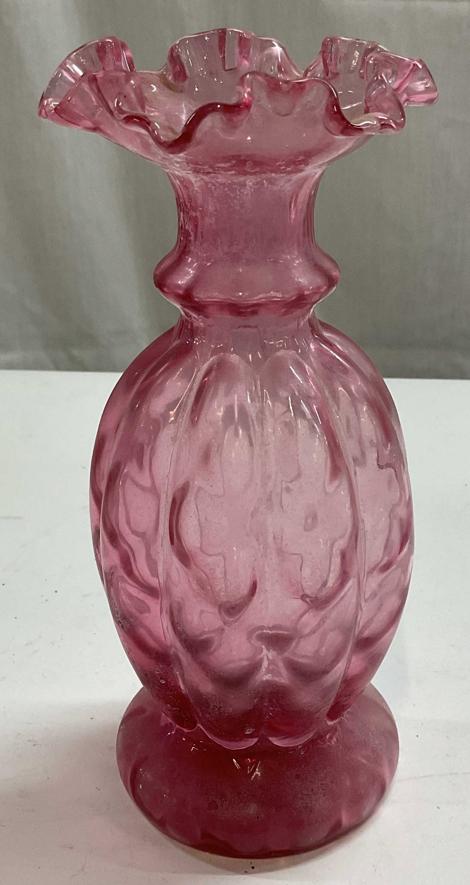 Vintage Pink Art Glass Handkerchief Vase: Vintage pink art glass vase with handkerchief rim and ribbed design. Measures approx 3.5 x 8.25 inches. Some wear including scratching observed. Art glass, art glass vase, pink vase, handkerchief vase