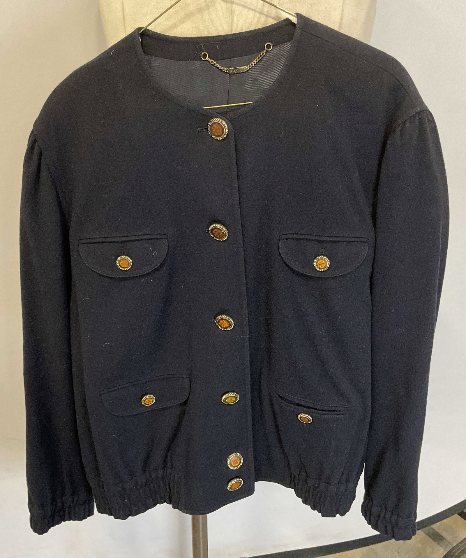 Vintage Basler Blue Wool Coat: Vintage Basler blue wool coat. Front button. Size 38. Wool outer and synthetic lining. One button needs replacement. Cracking to buttons observed. Basler, Basler coat, wool coat, designer coat, design