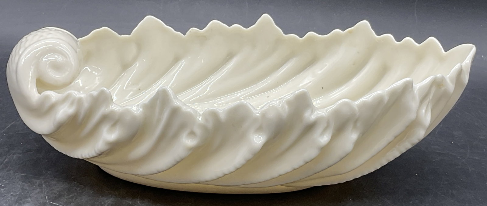 LENOX Signed Porcelain Shell Form Bowl, USA: LENOX Porcelain Shell Form Bowl. Signed on the underside LENOX, MADE IN USA. Measures approx. 3H x 9W in. Measured at widest point. Surface wear, discoloration, and residue present. home decor, home a