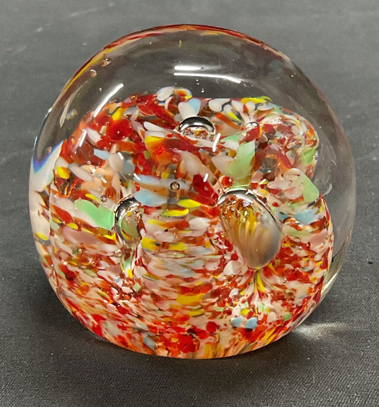 Hand Blown Red Green Swirl Art Glass Paperweight: Hand blown art glass paperweight with multicolor red, green, white and yellow swirl. Measures approx 2.5 inches wide. Some scratching observed. Art glass, art glass paperweight, paperweight, collectib