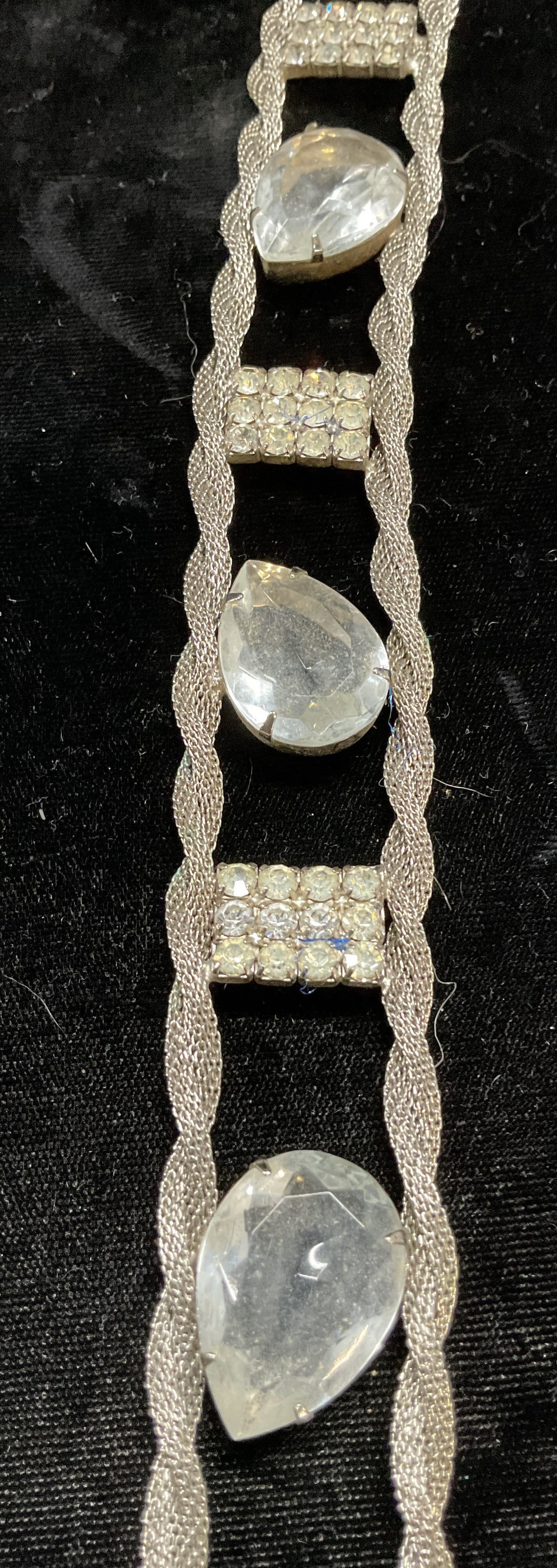 Vintage Silver Tone Chain & Crystal Belt: Vintage silver tone twisted mesh chain and colorless crystal belt. Measures approx 32 inches long. Some wear including scratching observed. Belt, vintage belt, silver tone belt, chain belt, crystal be
