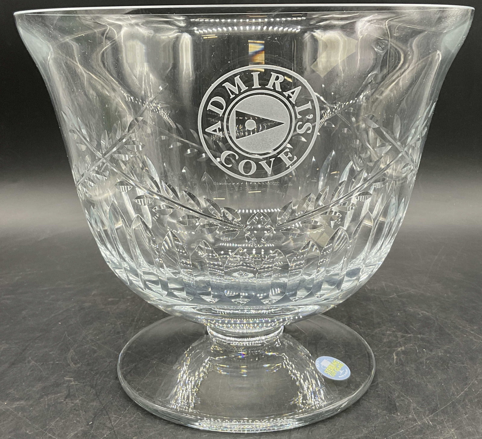 STERLING CUT GLASS Admirals Cove Footed Bowl: STERLING CUT GLASS Admirals Cove Footed Bowl. Obverse is engraved, Admirals Cove. Sticker to the base reads STERLING CUT GLASS, MADE IN POLAND. Comes with a STERLING CUT GLASS card. Measures approx. 7