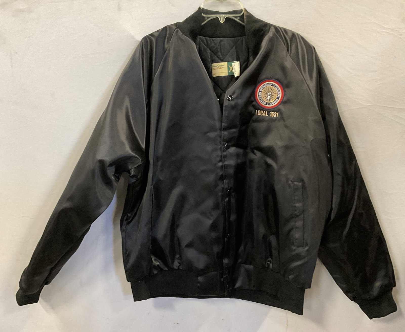 WEARGUARD USA LOCAL 1631 Patch Black Jacket: Vintage WEARGUARD USA LOCAL 1631 Patch Black Jacket. Snap button closure. Two pockets to the obverse. Patch to obverse reads INTERNATIONAL BROTHERHOOD OF ELECTRICAL WORKERS, LOCAL 1631. Brand tag read