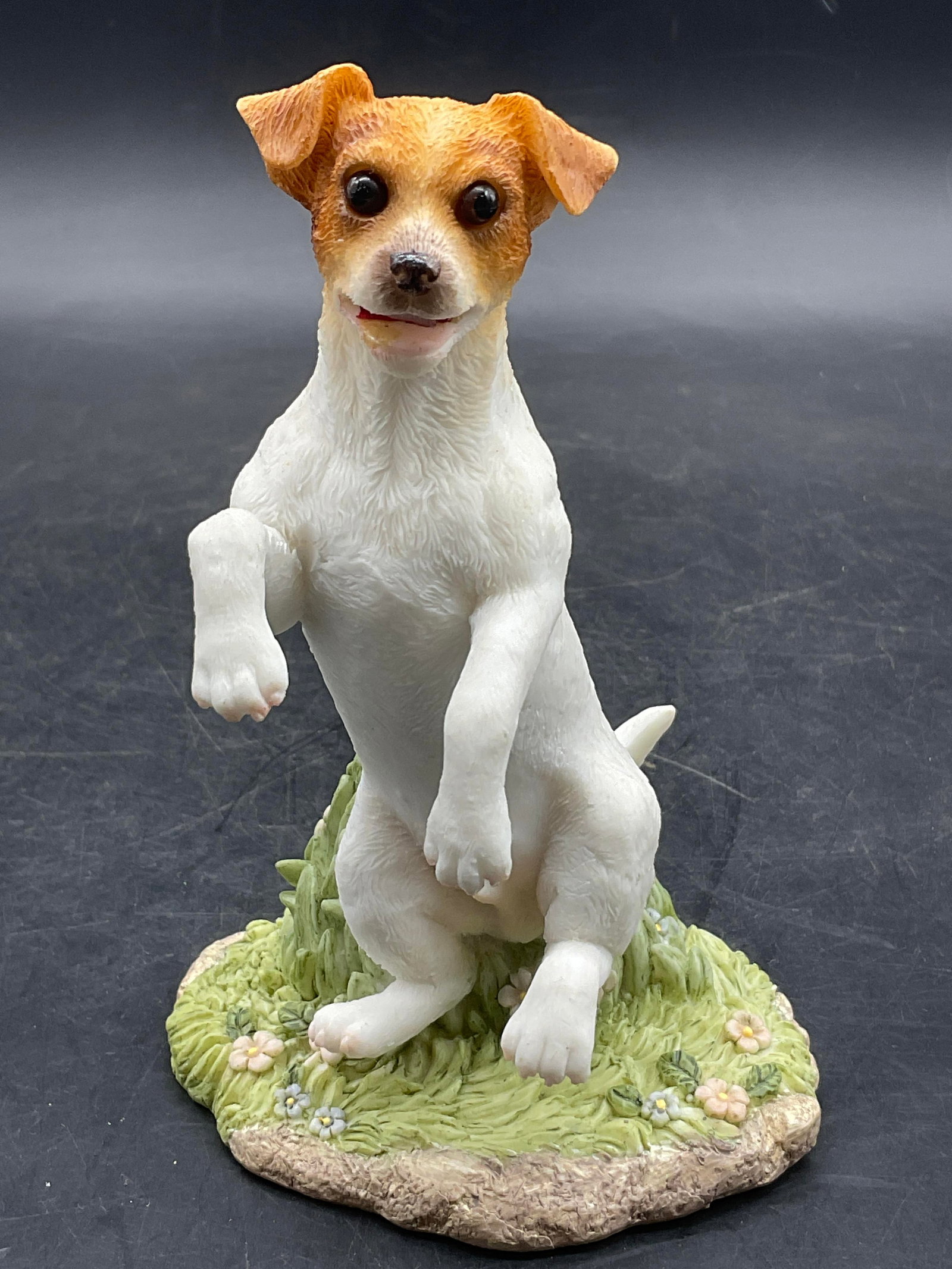 STONE CRITTERS JACK RUSSELL TERRIER Dog Figural: STONE CRITTERS JACK RUSSELL TERRIER Dog Figural. Crafted from resinous material. Sticker to underside reads UNITED DESIGN CORP, STONE CRITTERS, JACK RUSSELL TERRIER. Measures approx. 5.25H x 3.5W in. 