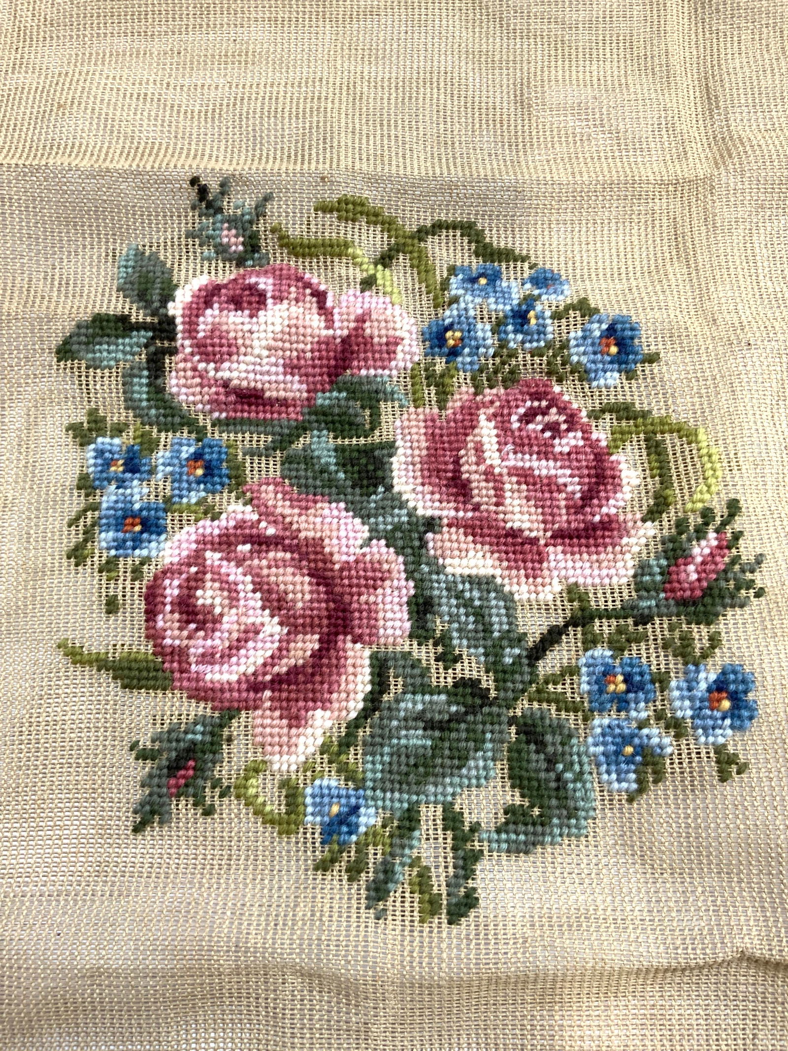 PARAGON NEEDLECRAFT Floral Needlepoint Tapestry: Tag reads PARAGON NEEDLECRAFT. Tapestry is tan toned. Piece has multi toned needlepoint floral and leaf detail. Piece also marks PARAGON. Tapestry measures approximately 26 inches square. Tapestry, ne