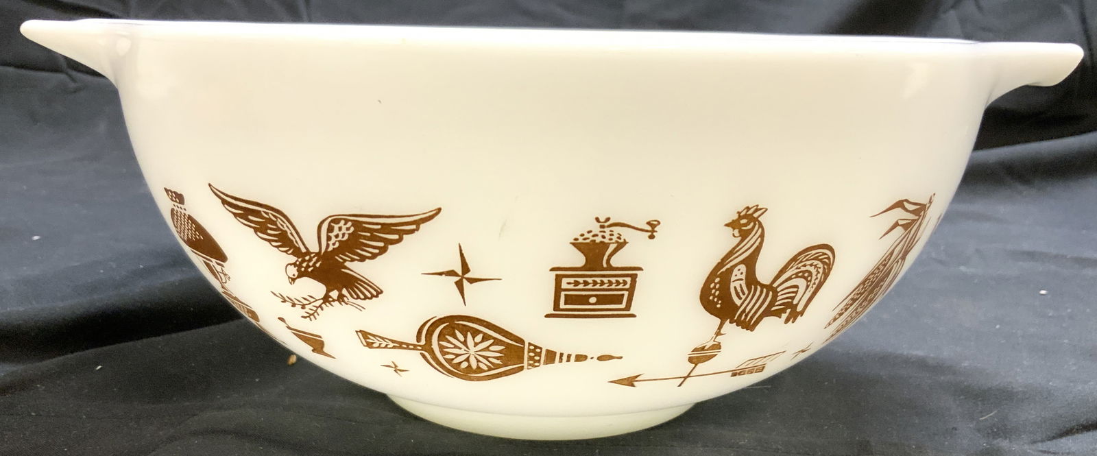 PYREX USA Vntg Glass Serving Bowl White & Brown: Underside reads PYREX MADE IN USA. Bowl is white with brown toned detail. Bowl is glass. Piece has handles at sides. Bowl measures approximately 10.75 inches wide 8.75 inches deep 4 inches tall. Bowl,