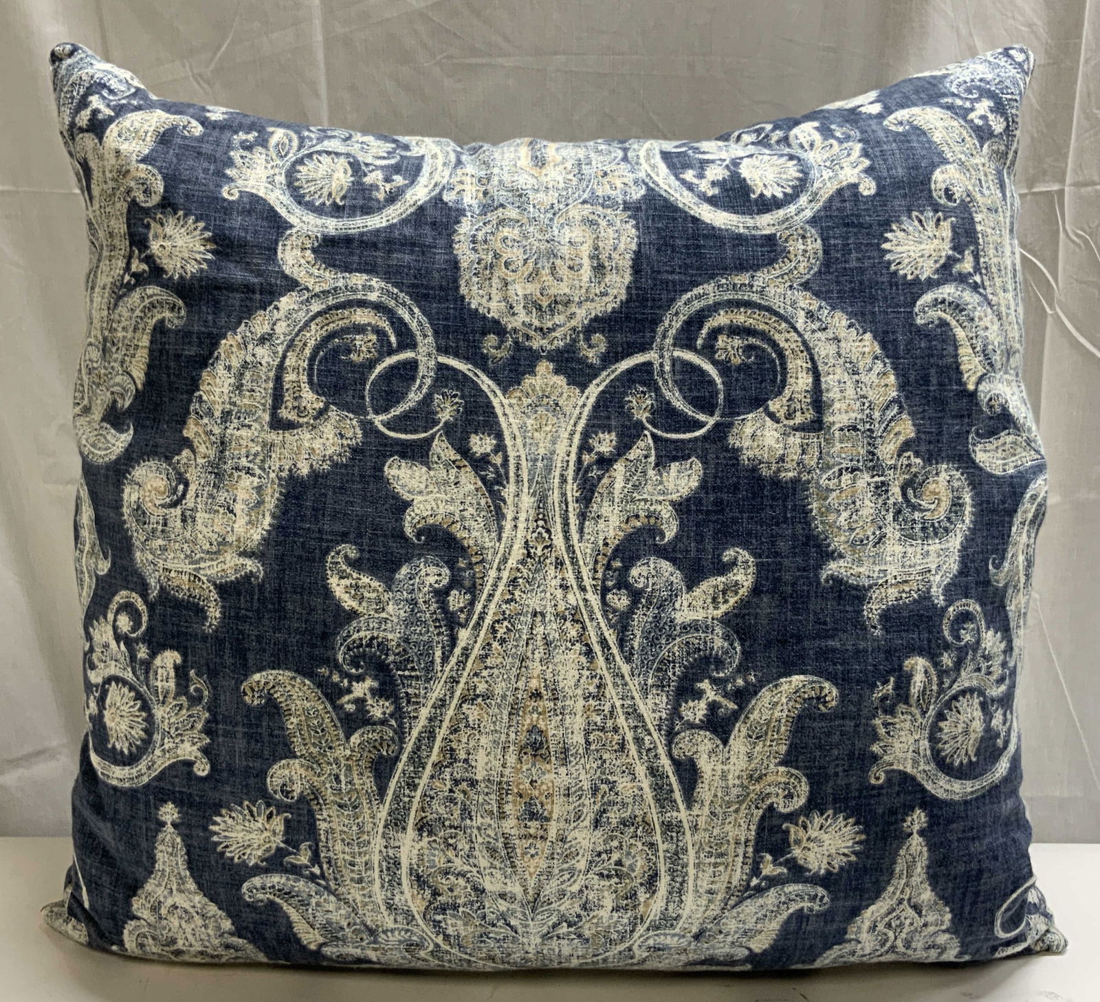 Floral Paisley Toss Cushion Pillow: Toss cushion has blue white and tan tones. Piece has floral, leaf & paisley detail. Pillow measures approximately 23.5 inches square. Pillow, homewares, home decor, toss cushion, toss pillow, sofa pil