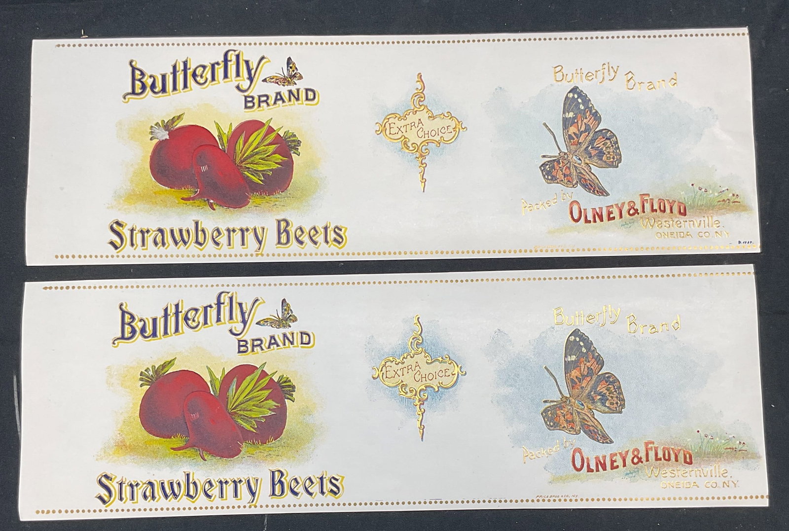 1920s Butterfly Strawberry Beets Crate Labels: Pair of circa 1920s Butterfly Brand strawberry beets crate labels. Labels read packed by Olney and Floyd, Oneida Company, New York. Lithograph on paper with strawberry and beet motifs. Measure approx 