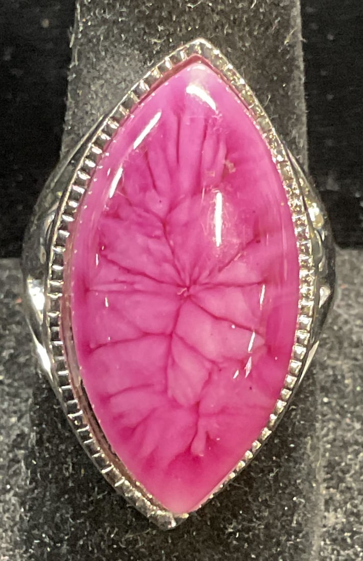Silver Tone Purple Faux Cabochon Ring: Silver tone cocktail ring with purple toned faux stone cabochon. Ring size 8.25. Setting measures approx 1.25 inch wide. Some wear including scratching. Jewelry, estate jewelry, costume jewelry, cockt