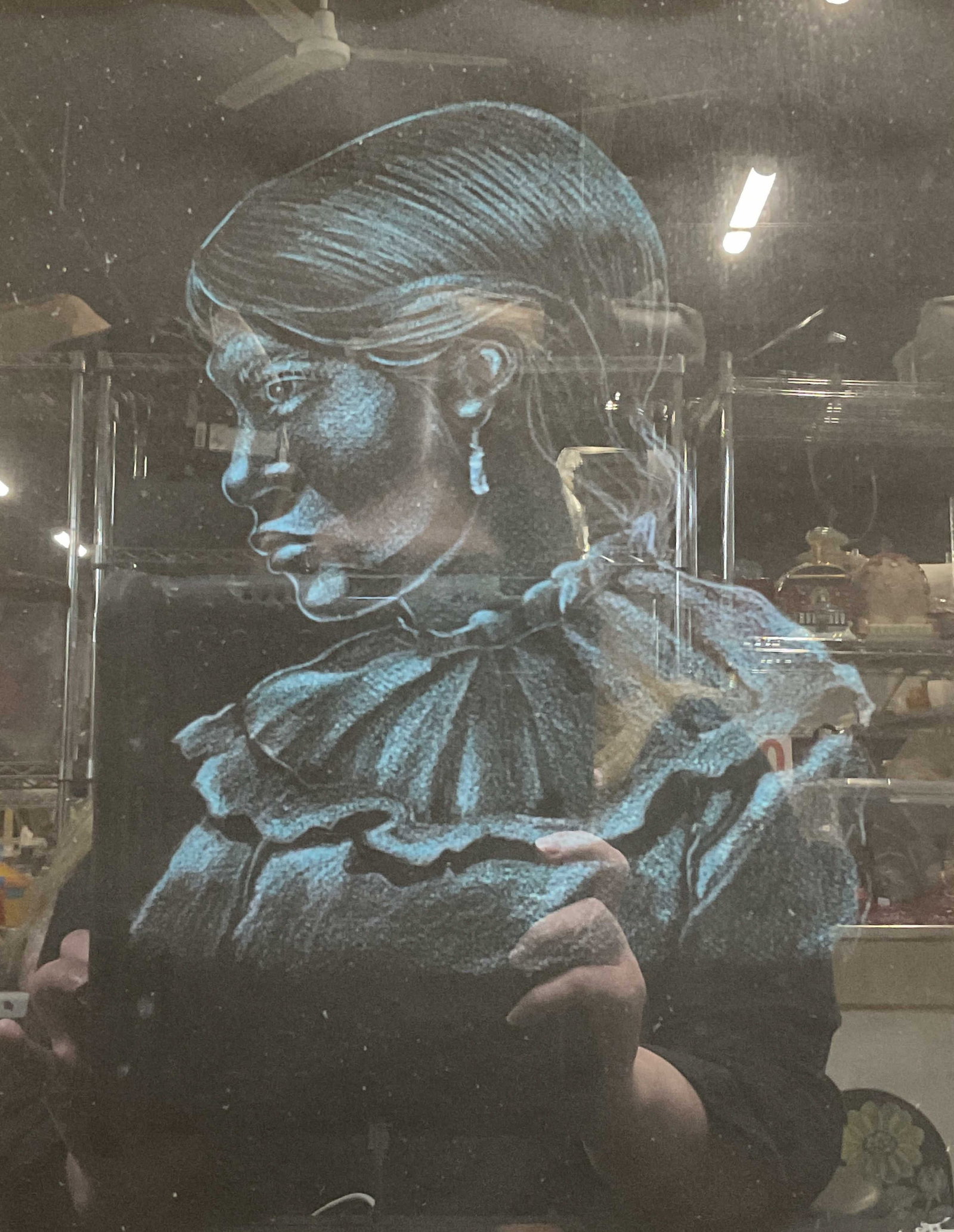Signed JBH Portrait of an Indigenous Woman Drawing: Signed and framed drawing on paper. Signature appears to read JBH on lower right. Indigenous woman, profile view from bust. Blue on black paper. Framed in black wood frame and matted. Not examined out