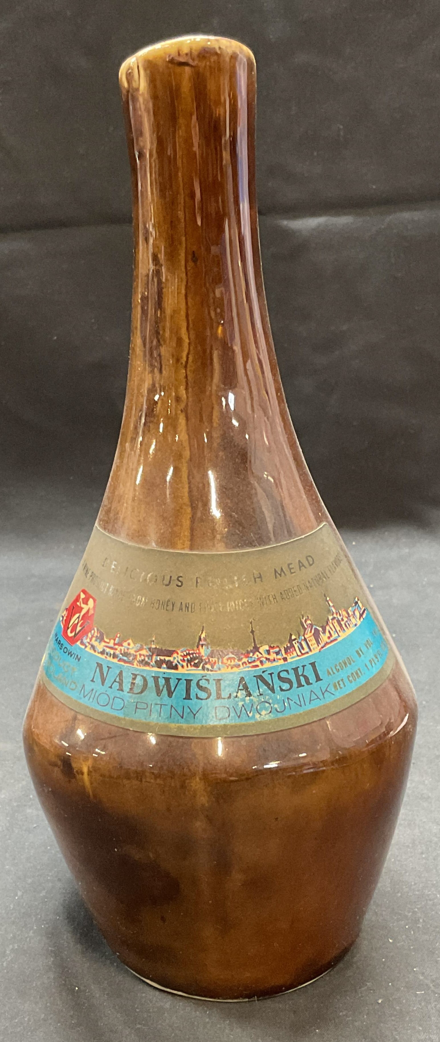 Vtg Nadwislanski Polish Mead Ceramic Jug Pitcher: Vintage Nadwislanski Polish mead ceramic jug/pitcher in brown. Trademarked on label. Measures approx 4 x 5 x 9.75 inches. Some surface wear consistent with exposure. Ceramic jug, ceramic pitcher, Mead