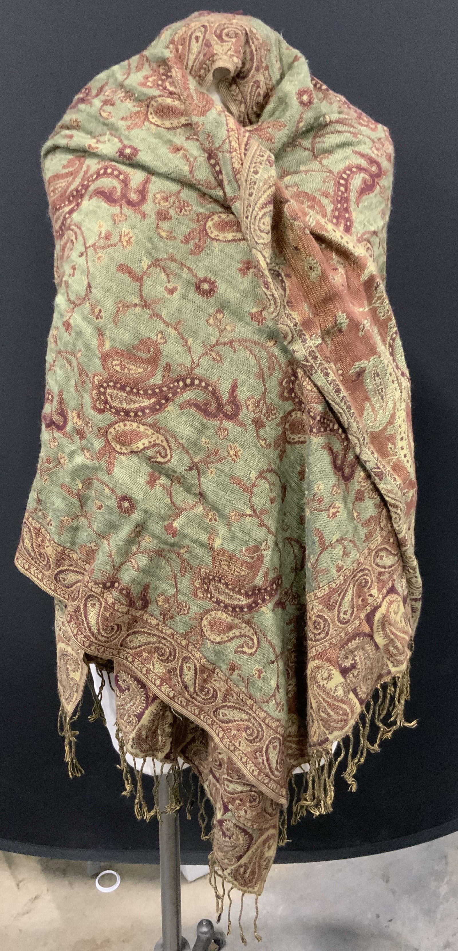 PASHMINA Cashmere Wool Scarf W Fringes: Scarf appears to be PASHMINA (no apparent tags). Scarf is cashmere wool. Piece has green, maroon, olive & gold toned paisley style & geometric detail. Scarf has fringes at edges. 72 inches long 25 inc