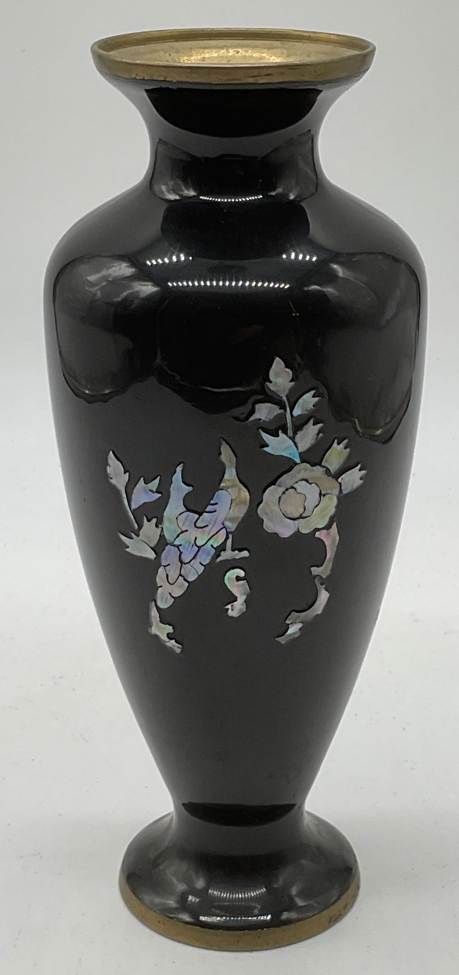 Vintage Brass Mother of Pearl Peacock Vase: Vintage Asian style brass vase with black composite and mother of pearl inlay. Peacock and flower motif. Measures approx 3 x 7.75 inches. Some wear including scratching observed. Vase, brass vase, bla