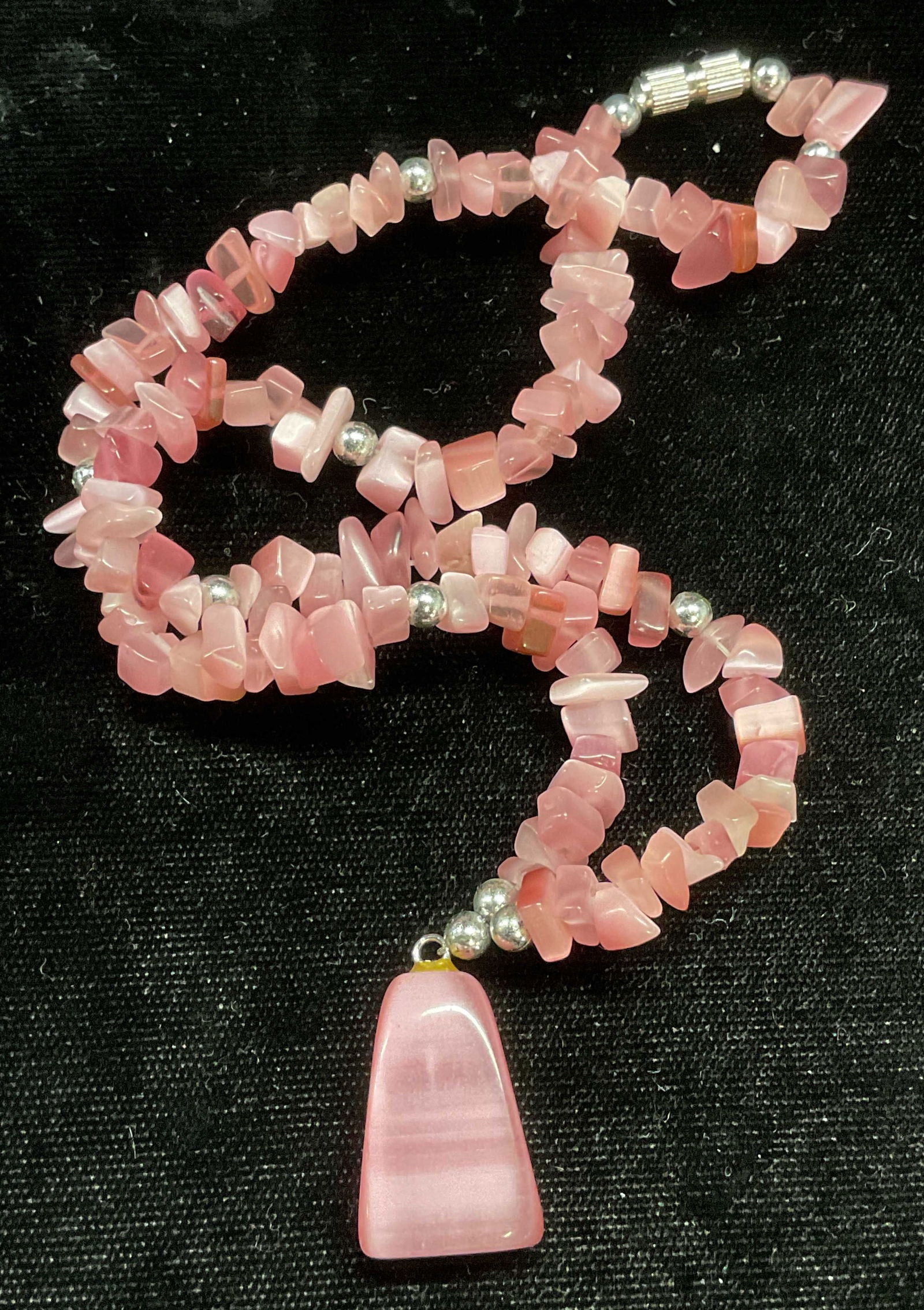 Pink Iridescent Glass Beaded Pendant Necklace: Pink iridescent glass and silver tone beaded pendant necklace. Drop length approx 7 inches. Some wear including scratching observed. Jewelry, estate jewelry, costume jewelry, cocktail jewelry, fashion