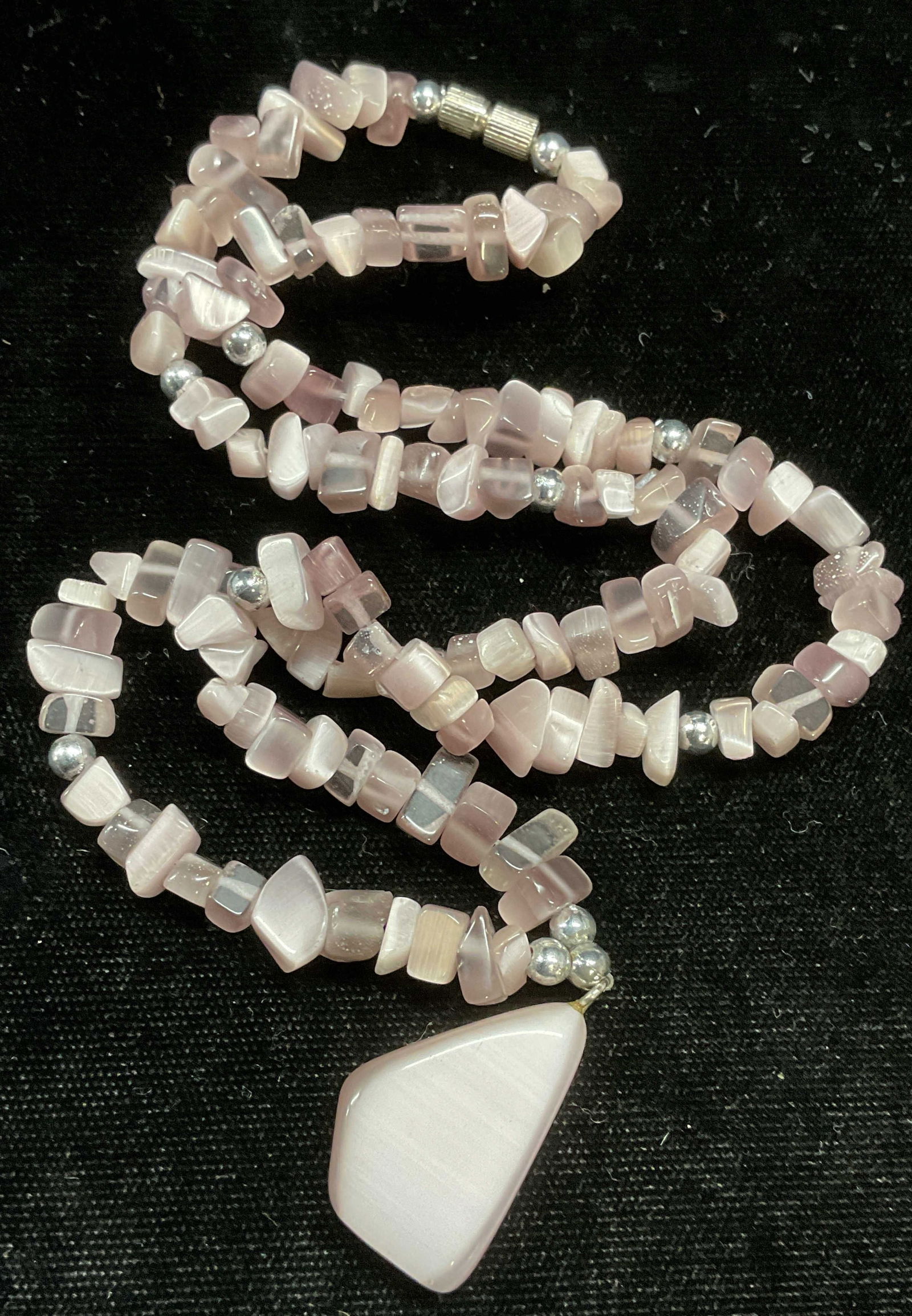 Iridescent Purple Beaded Glass Pendant Necklace: Purple iridescent glass and silver tone beaded pendant necklace. Drop length approx 8.5 inches. Some wear including scratching observed. Jewelry, estate jewelry, costume jewelry, cocktail jewelry, fas