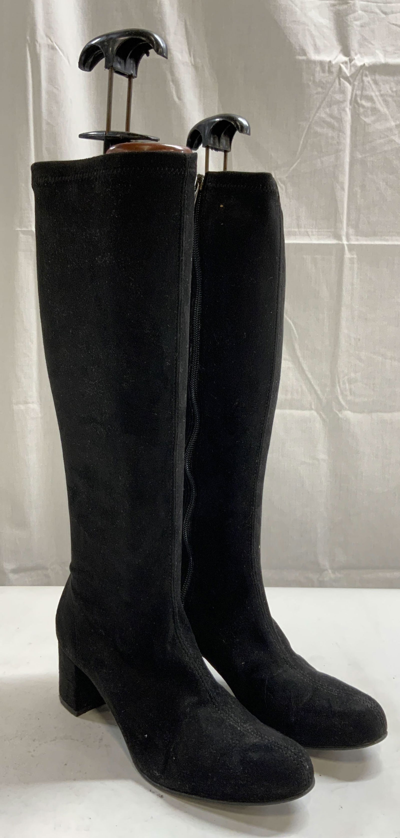 NILA & NILA Knee High Zippered Boots Blk 37 ITALY: Undersides read NILA & NILA MADE IN ITALY 37. Boots are black toned. Each boot has zipper. Interiors have shoe forms. Boots have 2.25 inch high heels. Zipper pulls are trademarked. Each boot measures