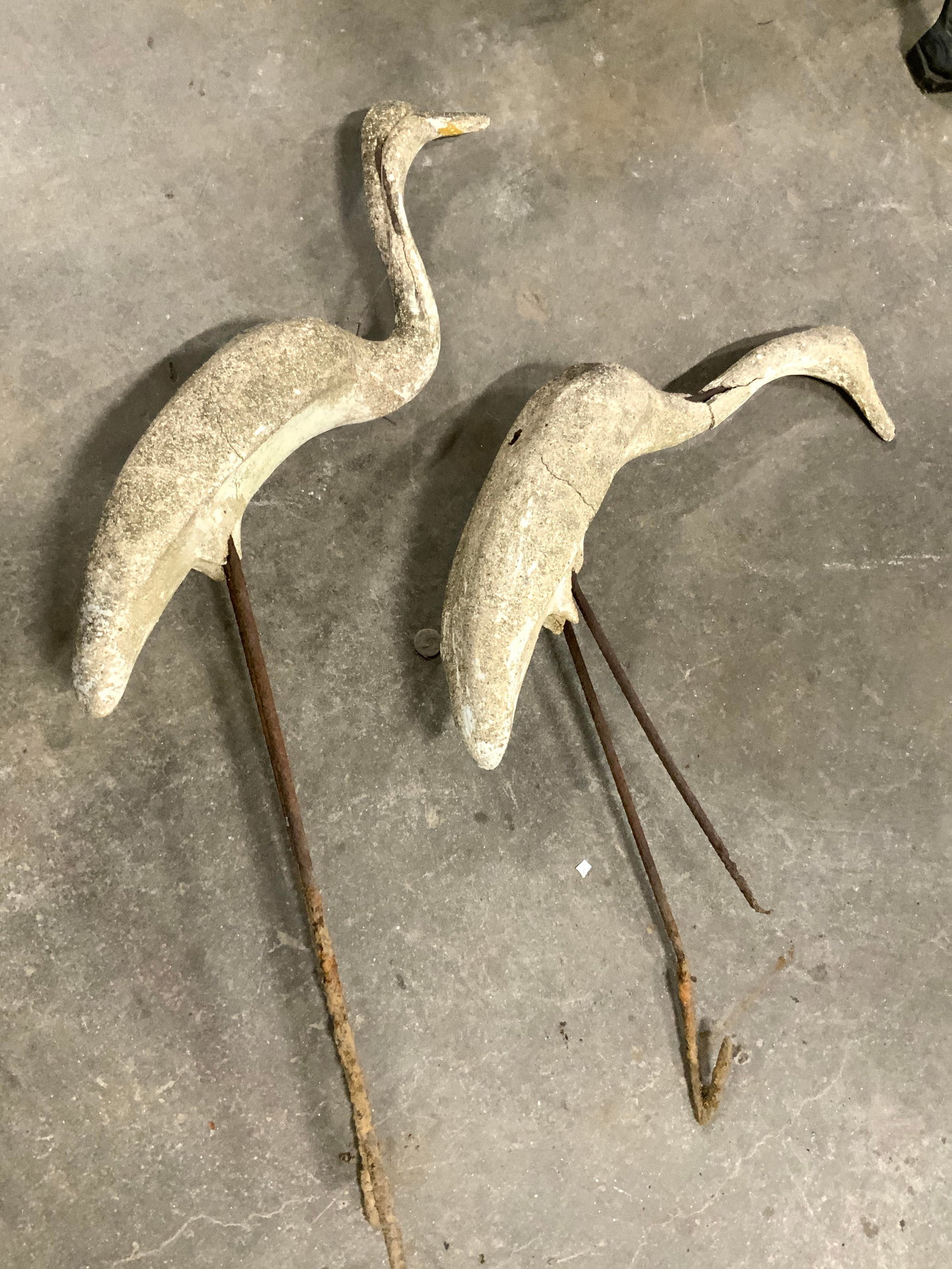 Lot 2 Cement Water Fowl Lawn Ornaments 39in: Lot includes 2 lawn ornaments. Each are cement and iron. Lawn ornaments appear to be vintage. Largest piece measures approximately 39 inches 19 inches deep 6.25 inches wide. Lawn ornaments, lawn decor