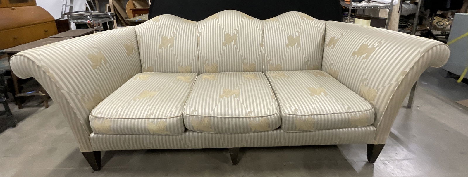 DONGHIA Upholstered Lion Motif Three Seater Sofa: DONGHIA Upholstered Lion Motif Three Seater Sofa. Tag reads DONGHIA A JOHN HUTTON DESIGN. Upholstered with soft hand upholstery. Measures approx. 37.25D x 96W x 38H in. Discoloration, losses to fabric