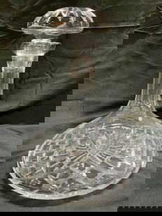 Cut Crystal Ships Decanter W Stopper: Decanter is crystal. Piece has diamond form relief detail. Decanter includes stopper. Ships decanter has wide set base & tapers inward towards top. Piece measures approx 9.5 inches tall 8.5 inches wid