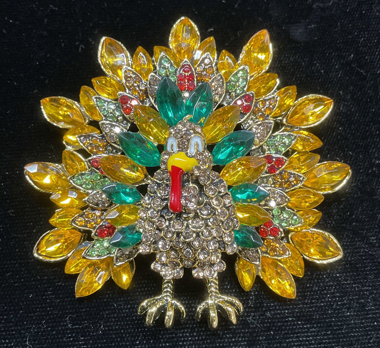 Gold Tone Crystal Turkey Statement Brooch: Gold tone turkey motif brooch with multicolor crystal and enamel decoration. Hinge pin on underside. Measures approx 2.5 x 2.5 inches. Some scratching observed. Jewelry, estate jewelry, costume jewelr