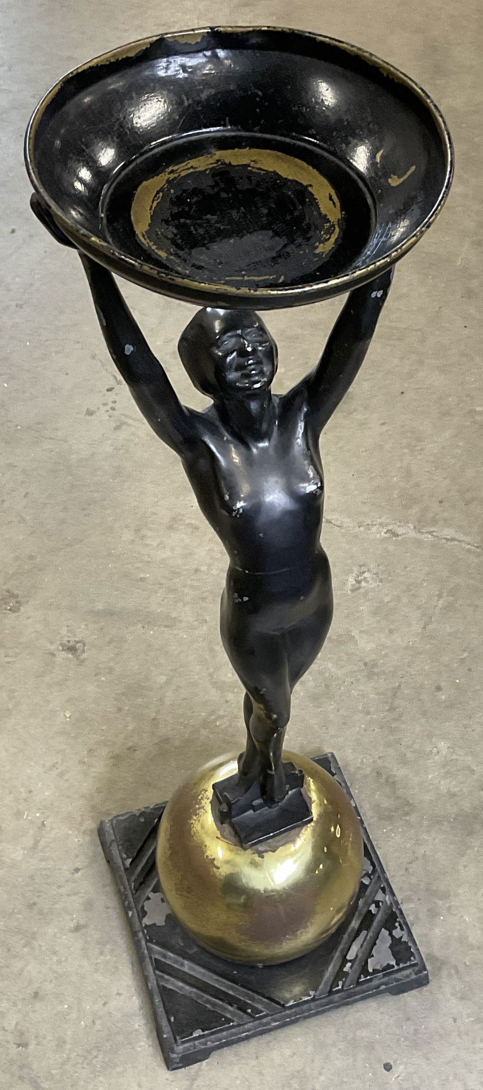 FRANKART Art Deco Nude Standing Ashtray 2ft: FRANKART Art Deco Nude Female Standing Ashtray. Crafted from metal. Black and brass hues to the piece. Measures approx. 23.5H x 7W in. Weighty. Hallmarked Frankart. Losses to finish, discoloration, an