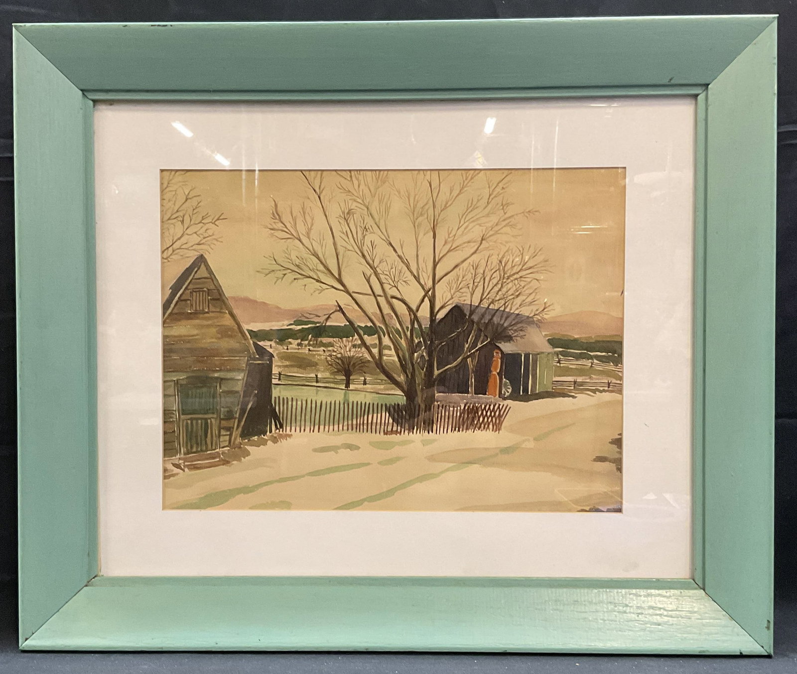 Framed Winter Sheds in Snow Watercolor Painting: Framed watercolor painting on paper. Winter landscape with sheds in snow. Framed and matted in blue wood frame. Not visible signature. Not examined out of frame. Measures approx 19.75 x 23.5 inches (f