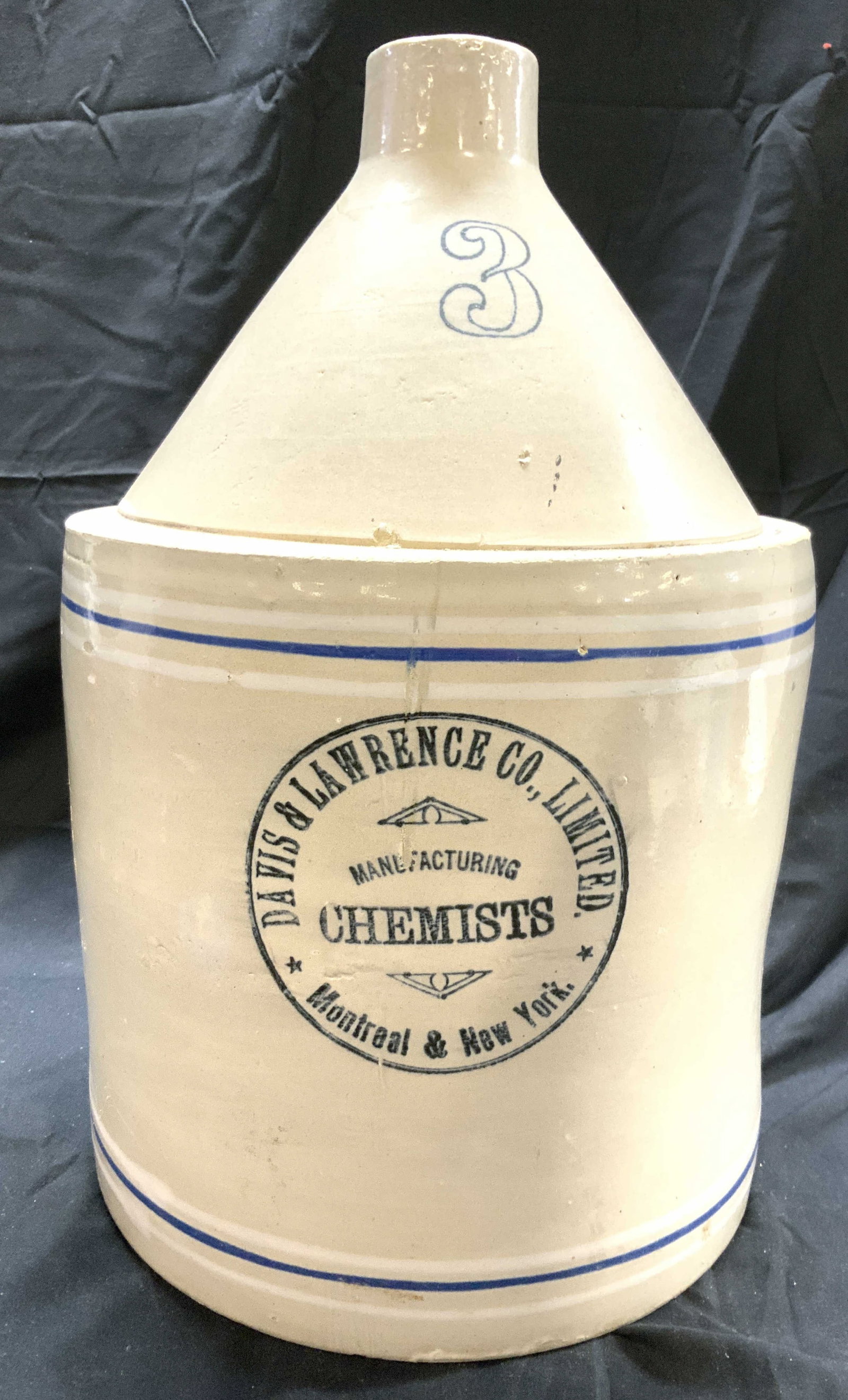 Davis & Lawrence Co Antq Ceramic Finger Crock: Trademark reads DAVIS & LAWRENCE CO LIMITED MANUFACTURING CHEMISTS MONTREAL & NEW YORK. Finger crock is antique and ceramic. Piece is marked with number 3. Crock has handle. Piece has blue and white t