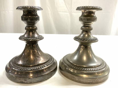 ENGLISH SILVER MFG CORP Pr Silv Pl Candlesticks: Undersides are inscribed ENGLISH SILVER MFG CORP. Lot includes 2 candlesticks. Each are vintage. Each candlestick has areas of relief pattern detail. Each piece has circular form bases. Candlesticks m