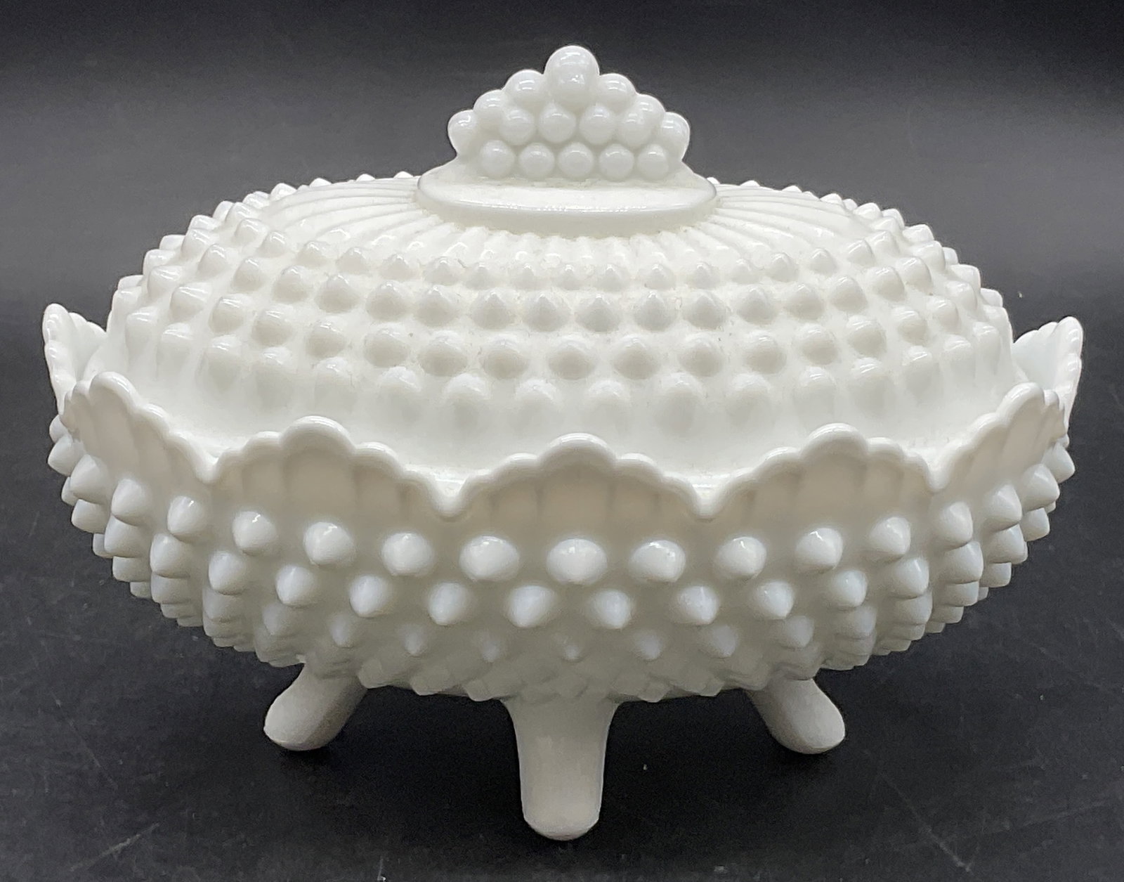 Vntg Hobnail Milk Glass Footed Trinket Dish, Lid: Vintage Hobnail Milk Glass Footed Trinket Dish. Lidded. Measures approx. 5.25H x 6.5W in. Surface wear and residue present. Seam present. home decor, home accents, homewares, housewares, home accessor