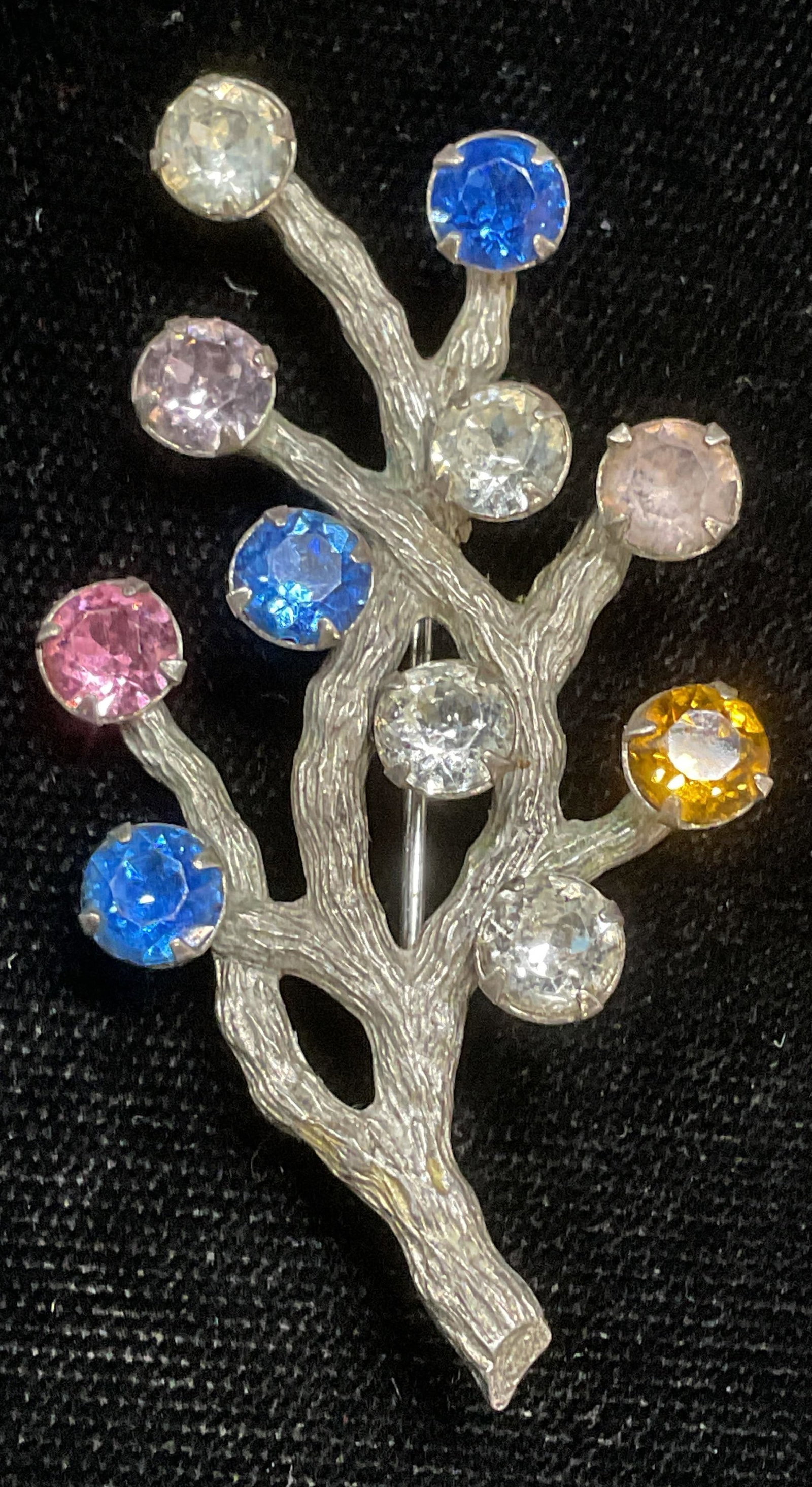 Vintage Van Dell Sterling Silver Crystal Brooch: Vintage Van Dell sterling silver botanical brand and flower motif brooch with multicolor crystal. Signed on underside. Marked sterling. Measures approx 2 x 1 inches. Total weight 5.7 grams. Some wear 