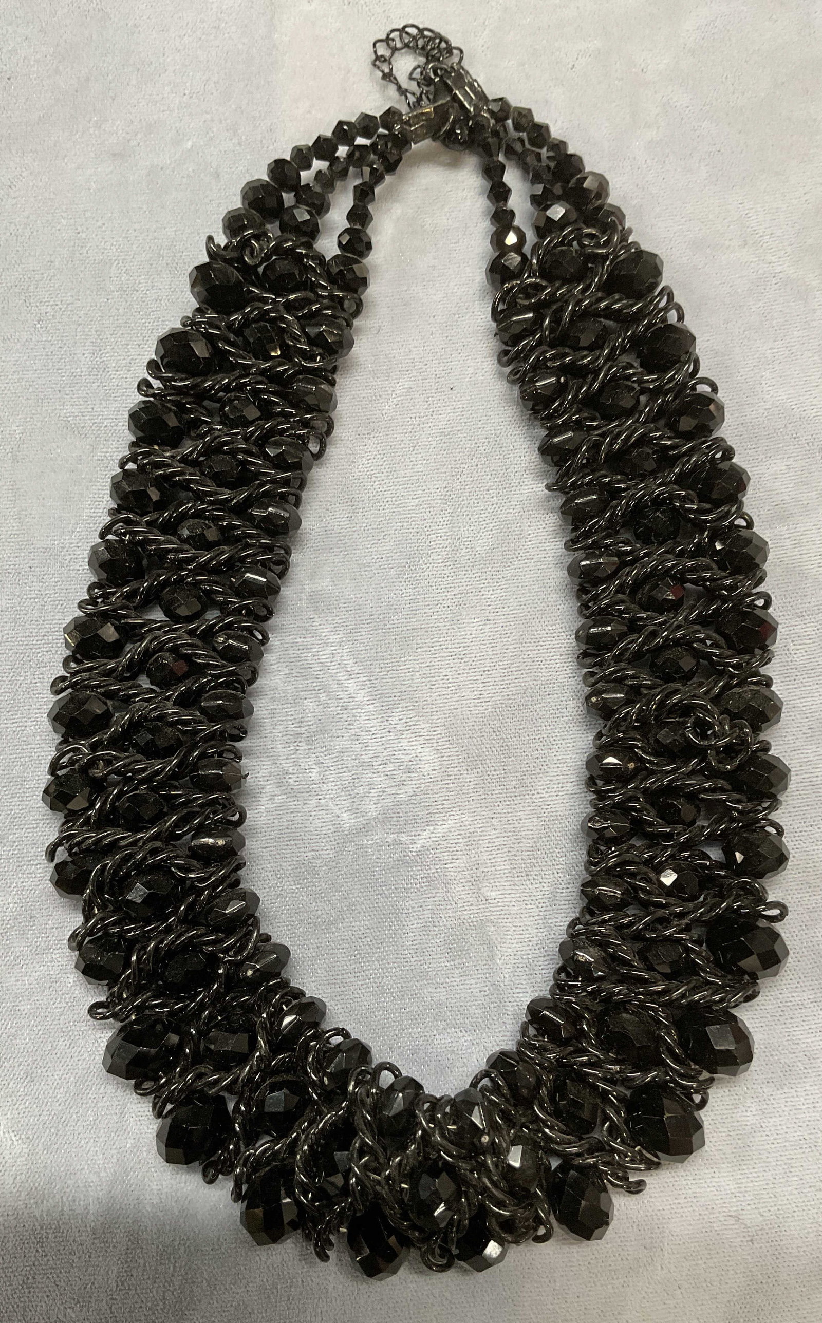 Black Crystal Twisted Wire Necklace: Black necklace with twisted wire band and beaded crystal. Drop length approx 8 inches. Some wear including scratching observed. Jewelry, estate jewelry, costume jewelry, fashion jewelry, cocktail jewe