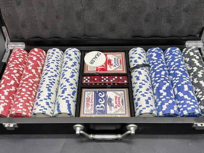 New in Box Poker Set W/ Chips, Dice, & Cards: New in Box Poker Set W/ Chips, Dice, & Cards. Contained in a black wooden case. The case measures approx. 18W x 2.5H in. Lid opens with metal hinge hardware. Pieces appear to have not been used. Packa
