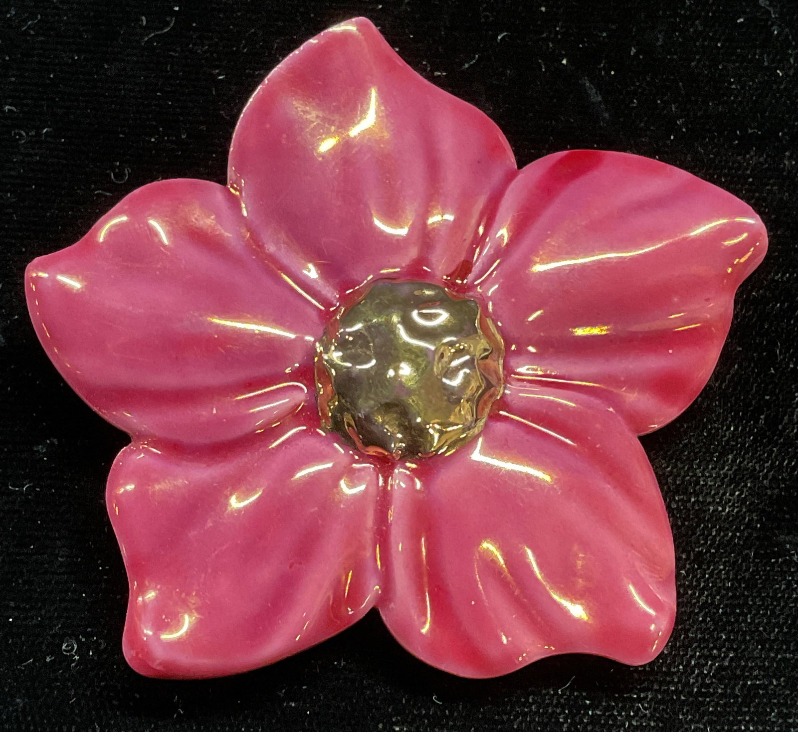 Pink Porcelain Luster Flower Brooch Pendant: Porcelain flower brooch/pendant with pink luster glaze. Hinge pin and nail on underside. Measures approx 2.5 inches wide. Some wear including scratching. Jewelry, estate jewelry, costume jewelry, cock